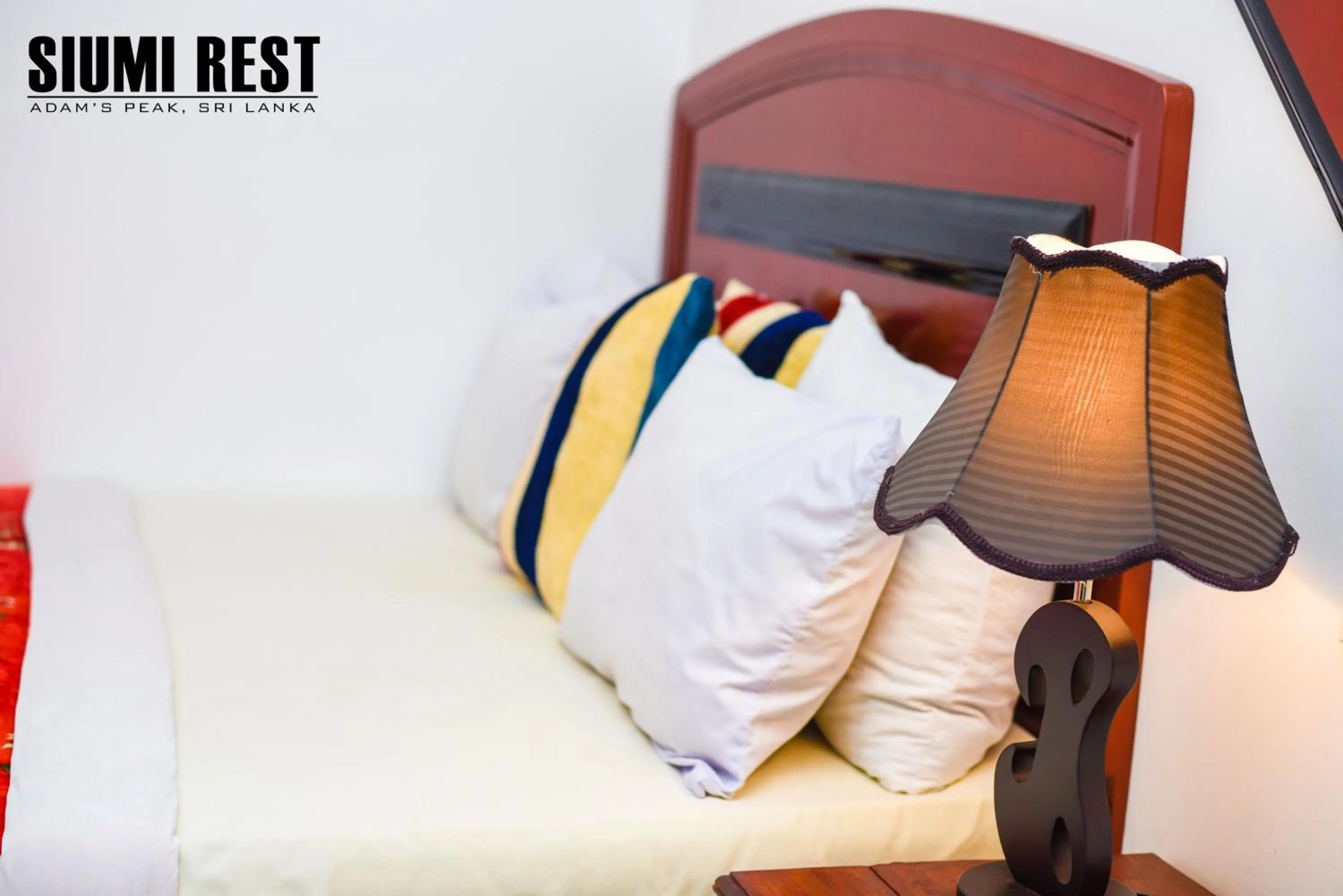 Seating area, Bed in Siumi Rest