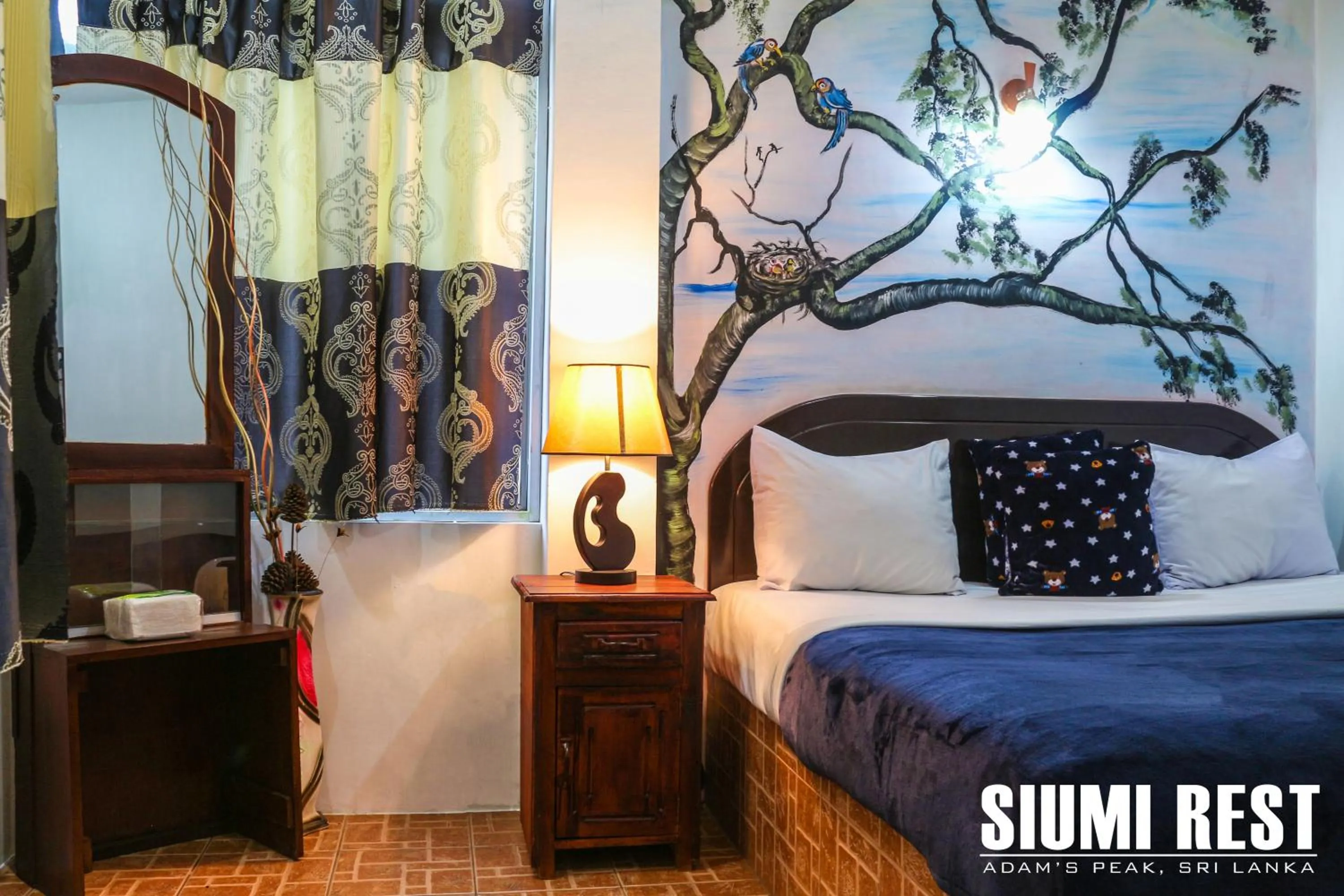 Seating area, Bed in Siumi Rest
