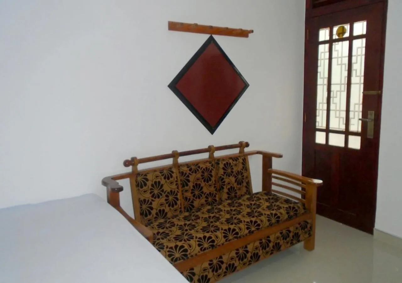 Seating area, Bed in Siumi Rest