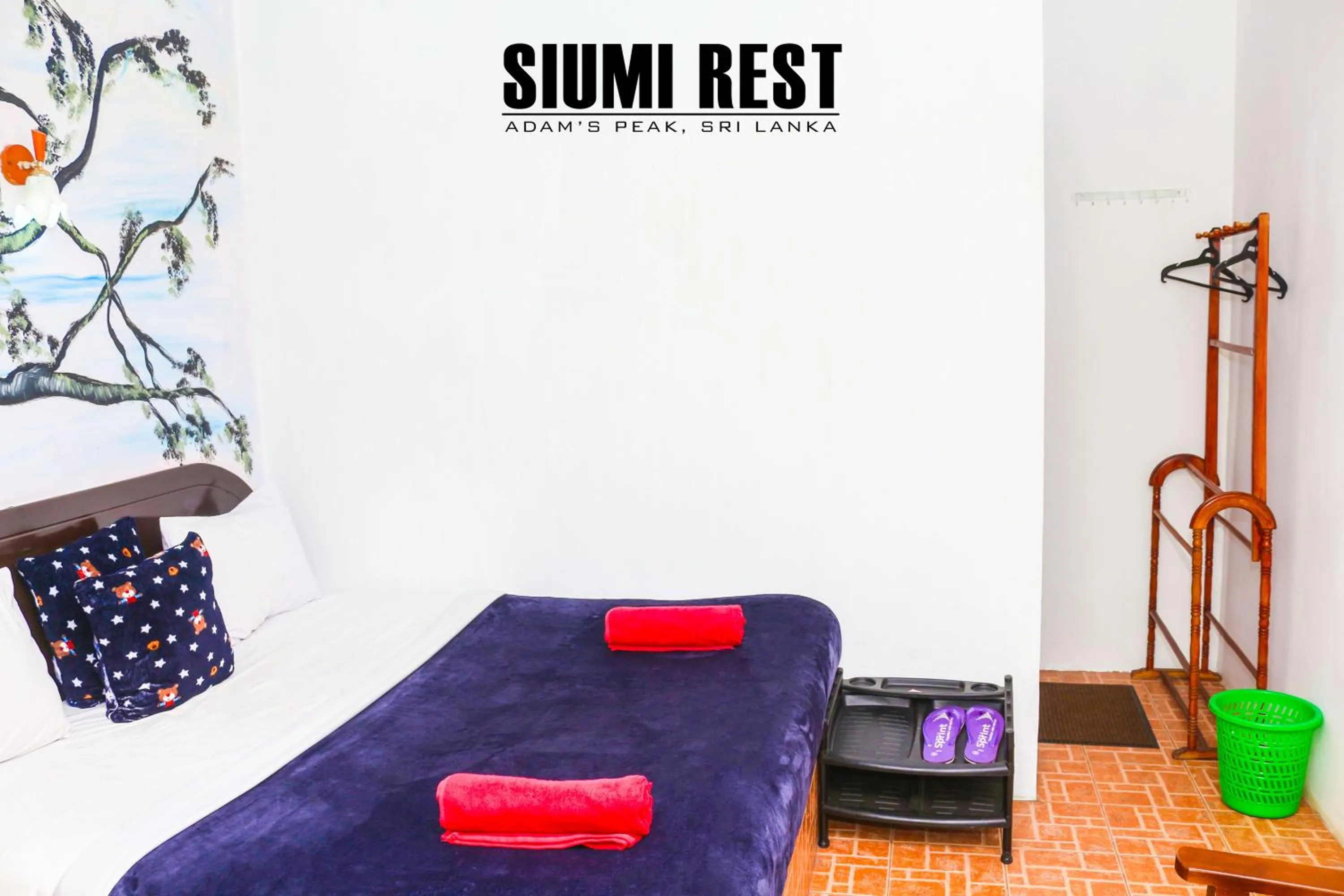 Seating area, Bed in Siumi Rest
