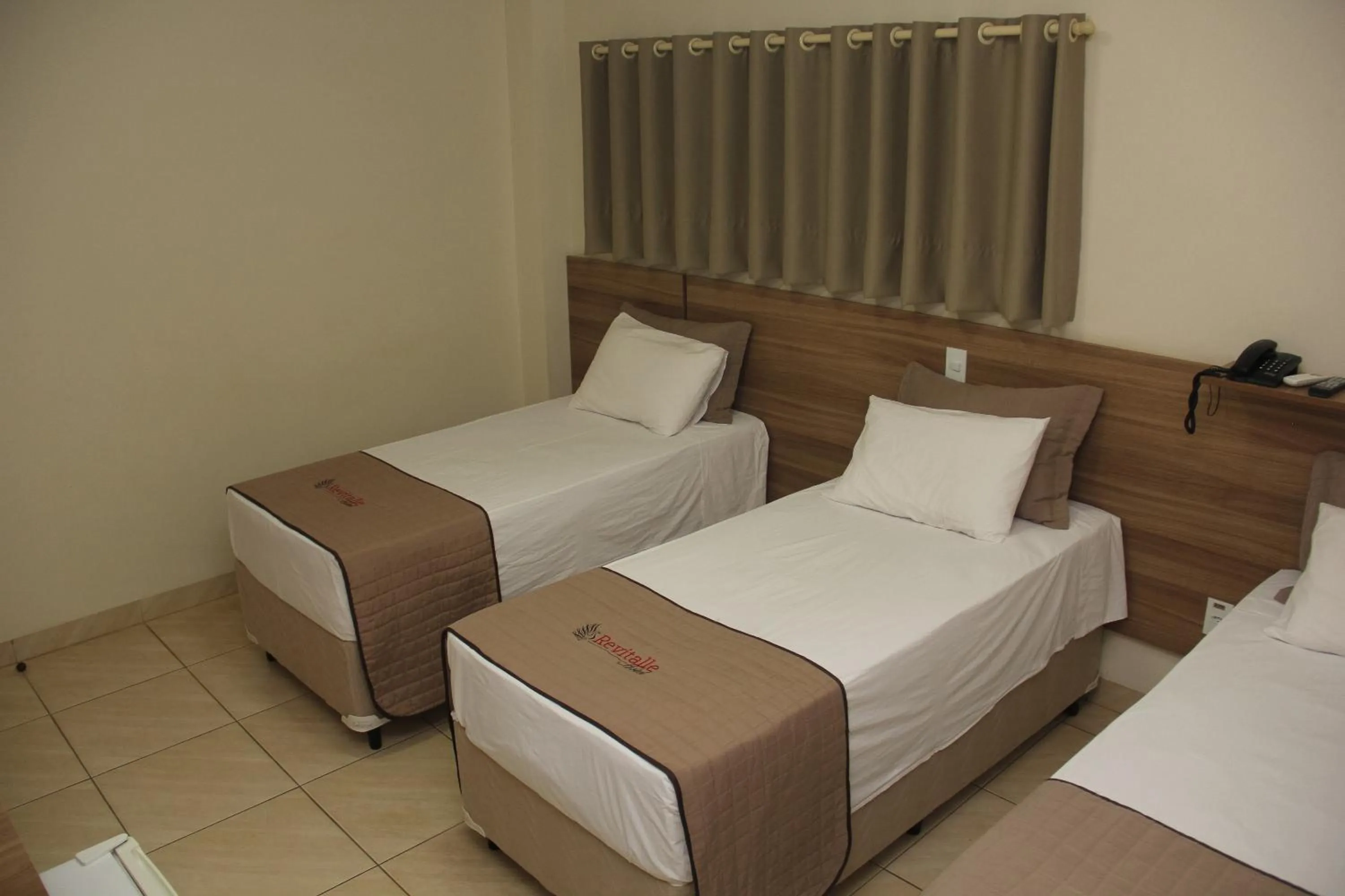 Bed in Revitalle Hotel