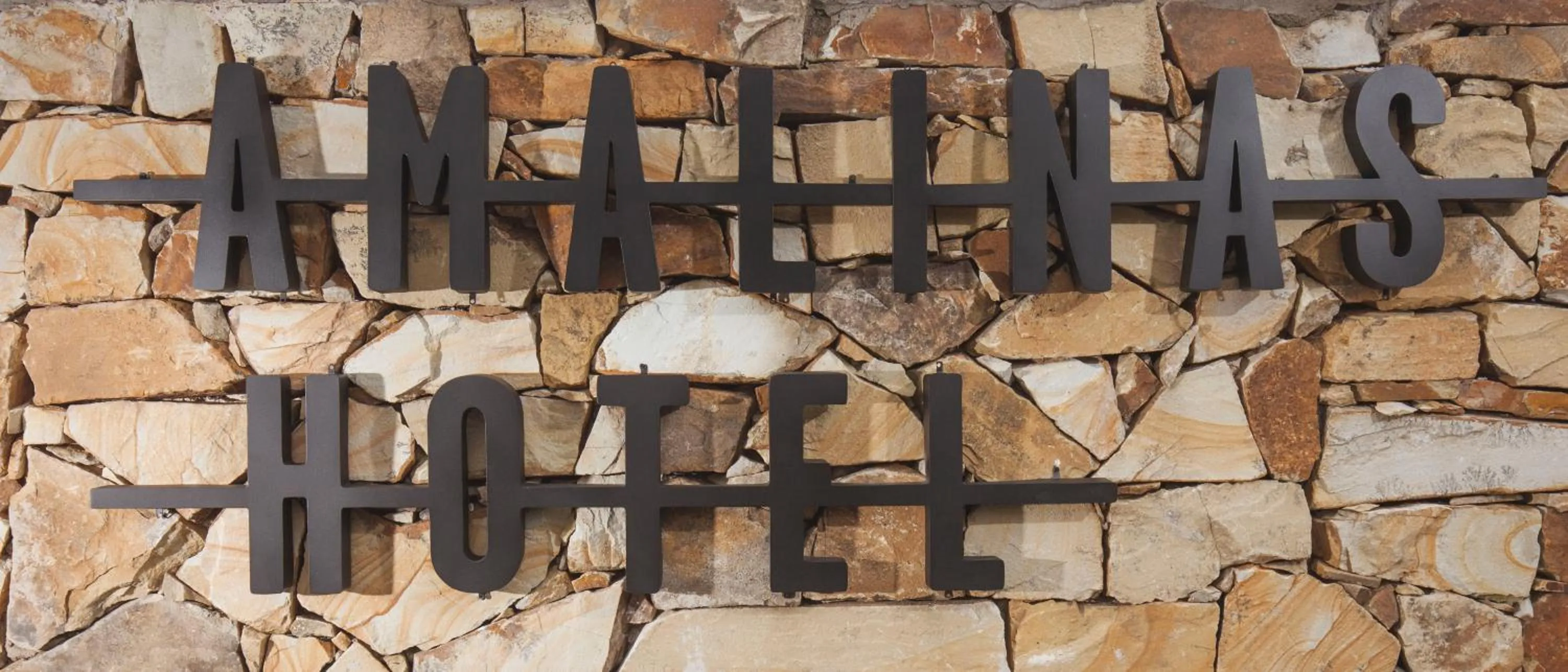 Property logo or sign in Amalinas Hotel