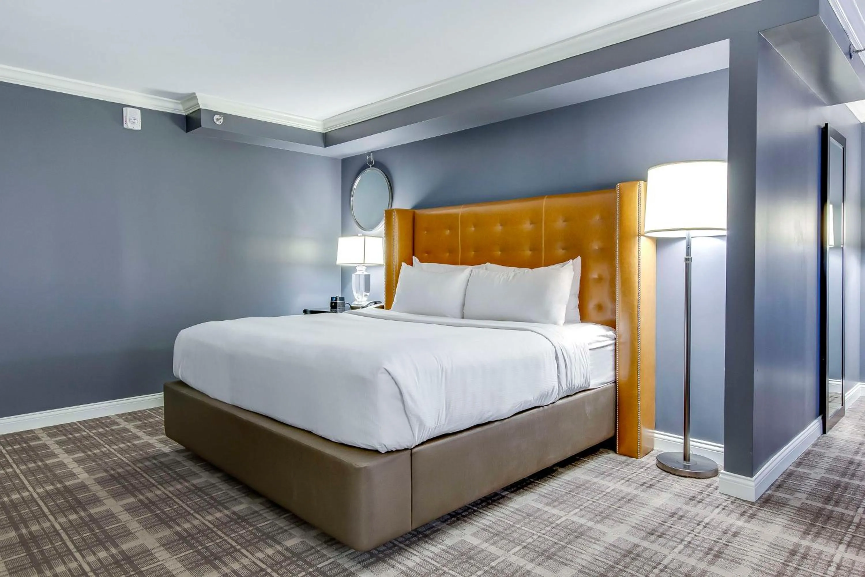 Bed in The Campbell House Lexington, Curio Collection by Hilton