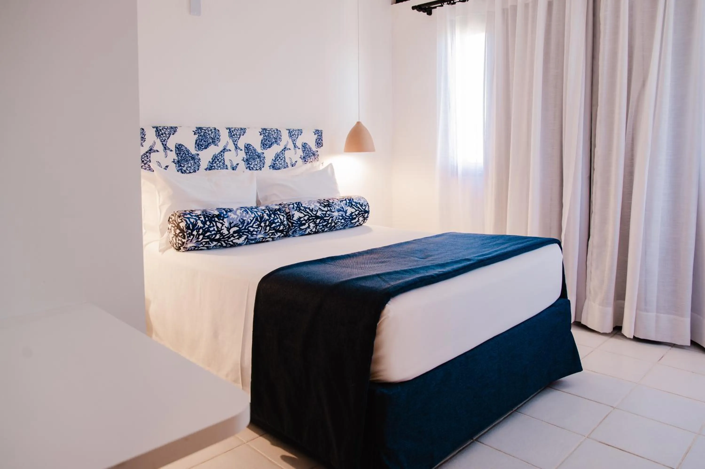 Bed in Pousada Aldeola by Slaviero Hotéis