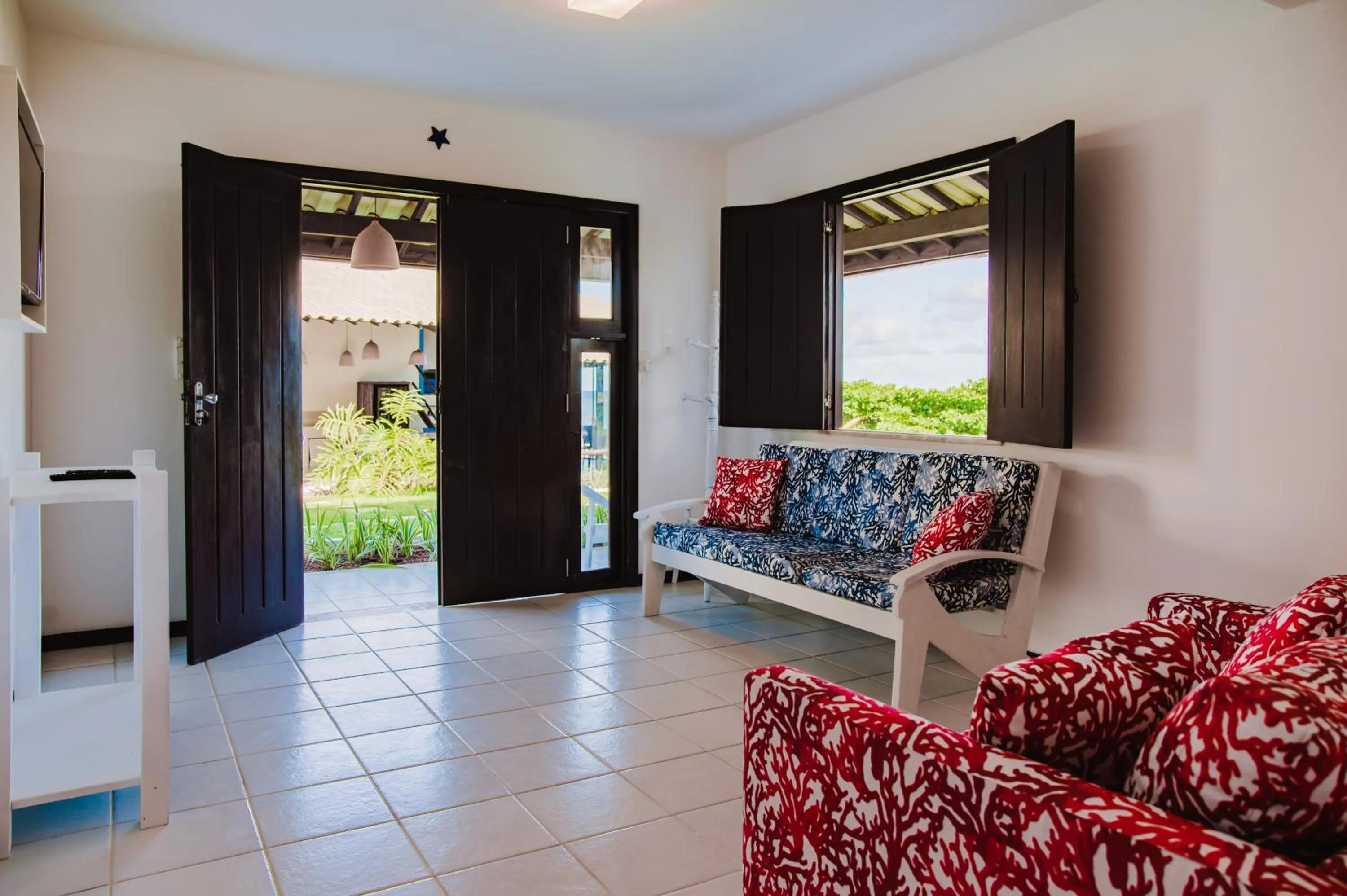 Seating area in Pousada Aldeola by Slaviero Hotéis