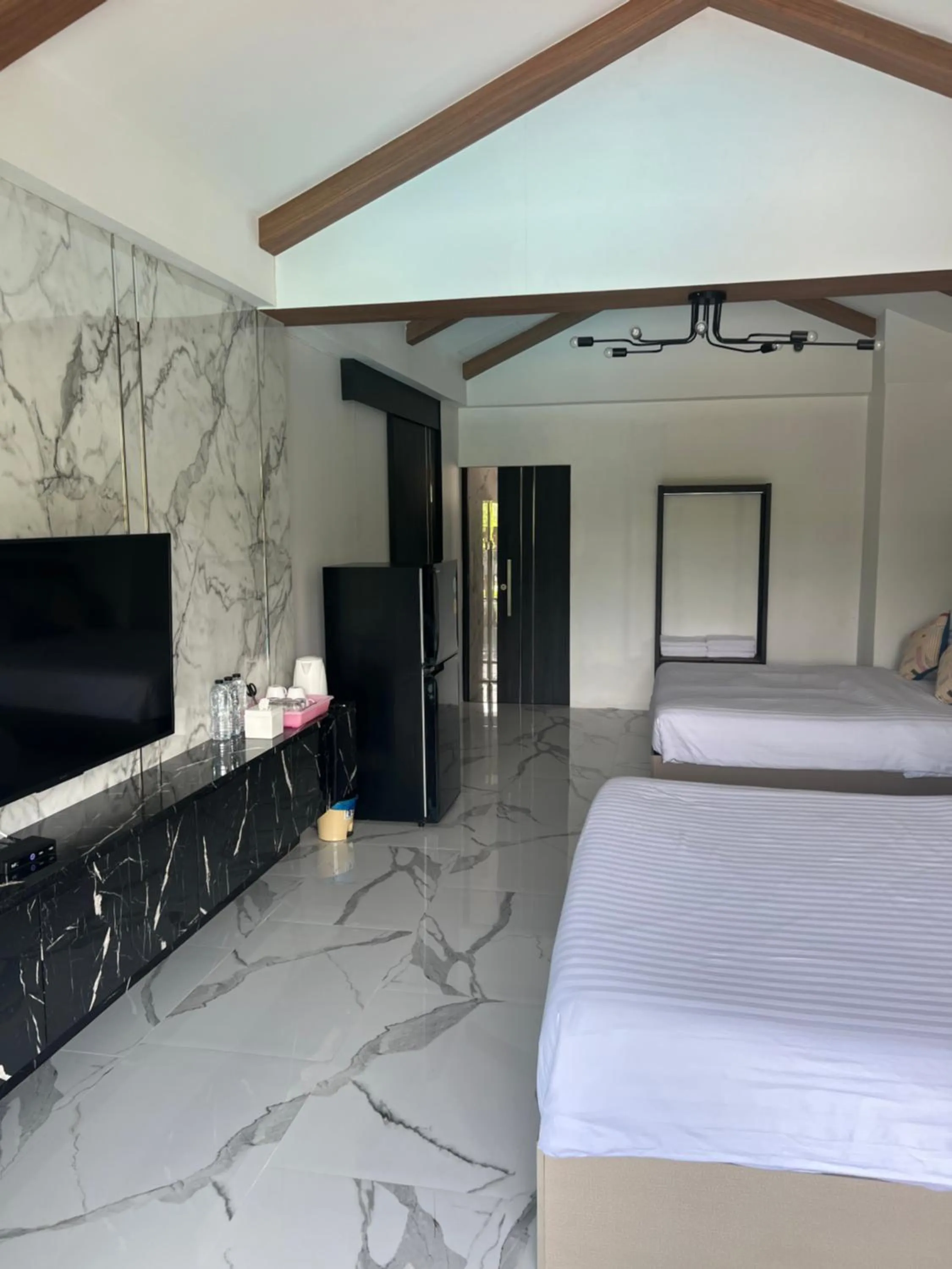 Bed in Thipburee Resort