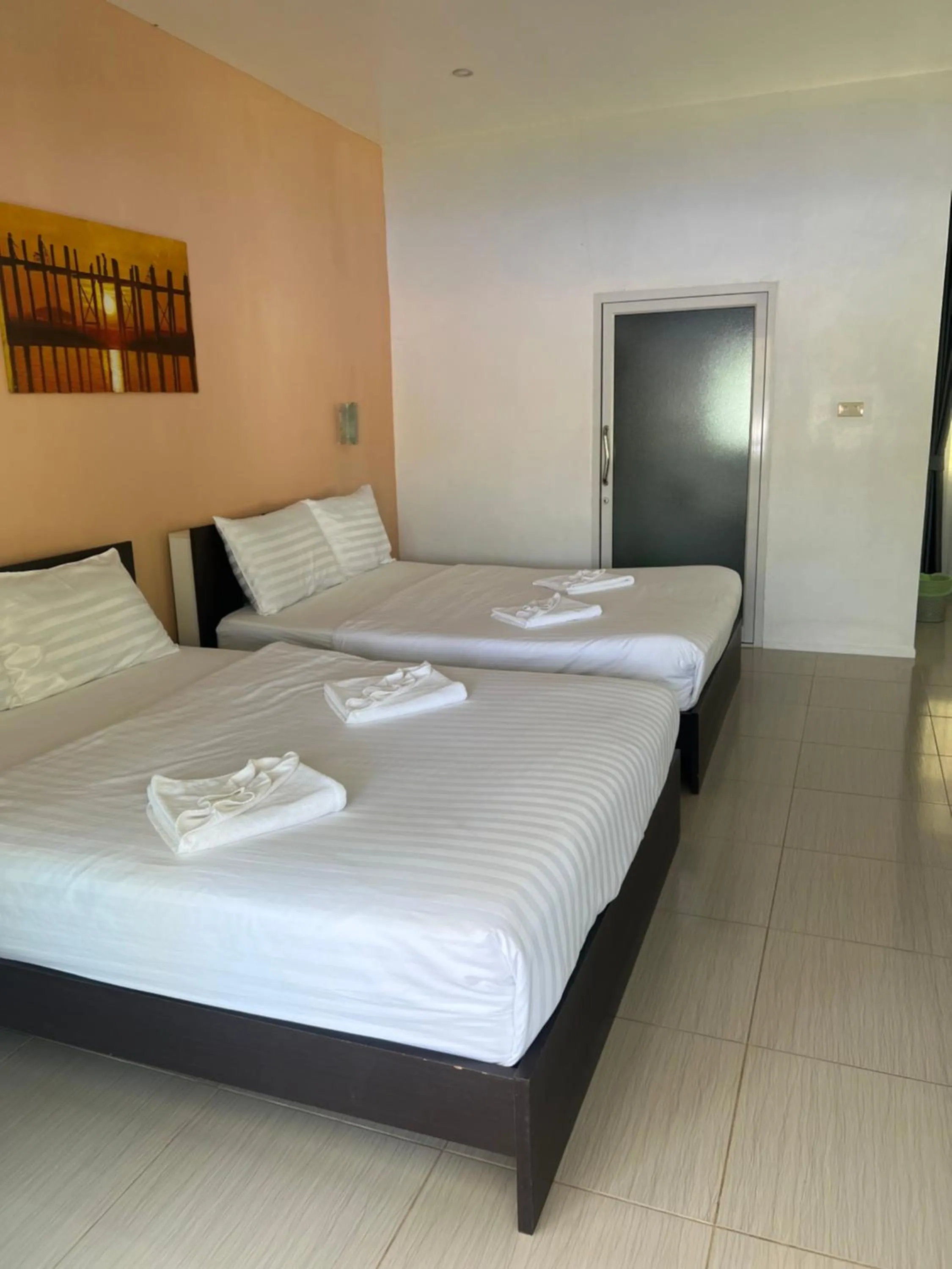 Bed in Thipburee Resort