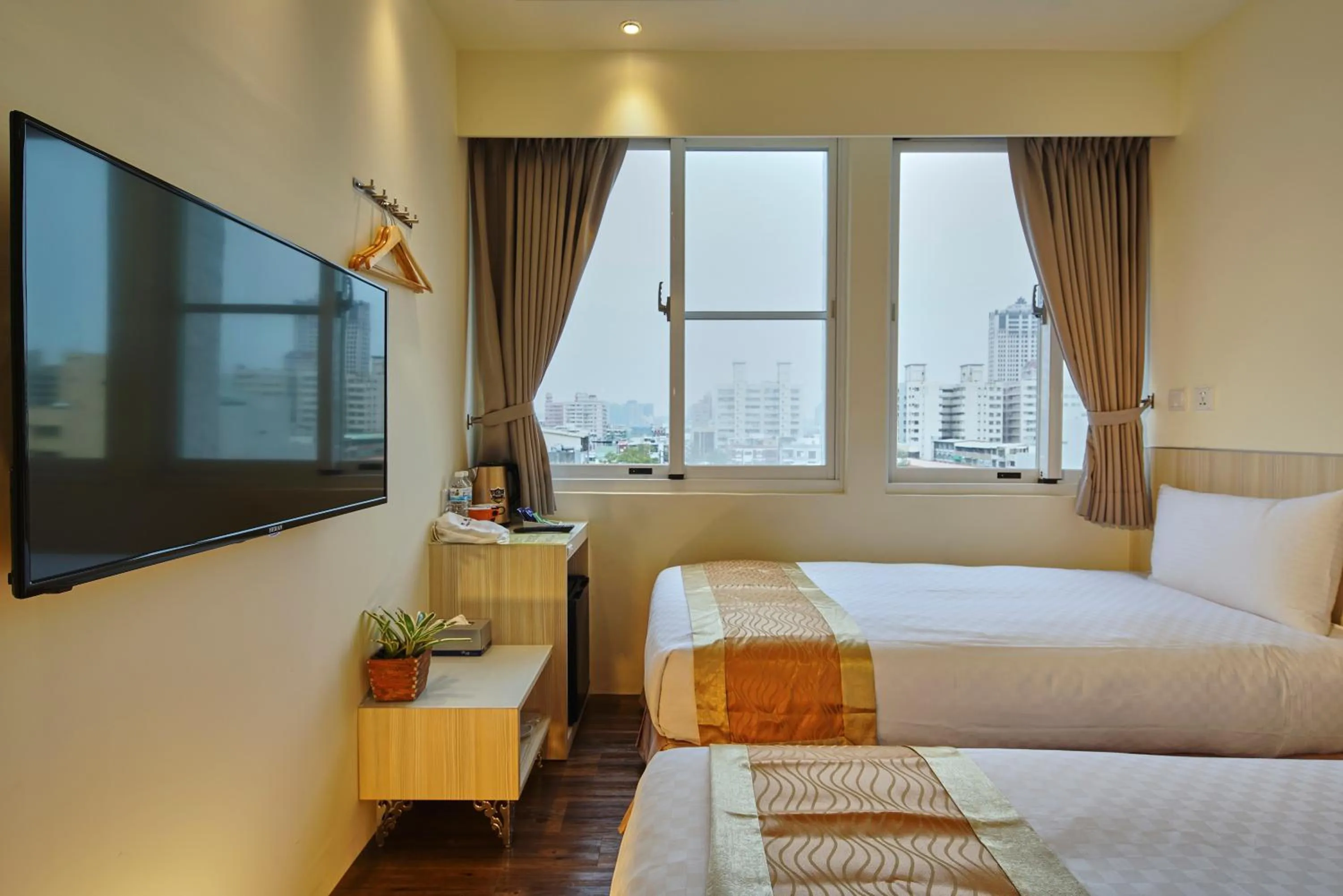 Photo of the whole room, Bed in M Hotel