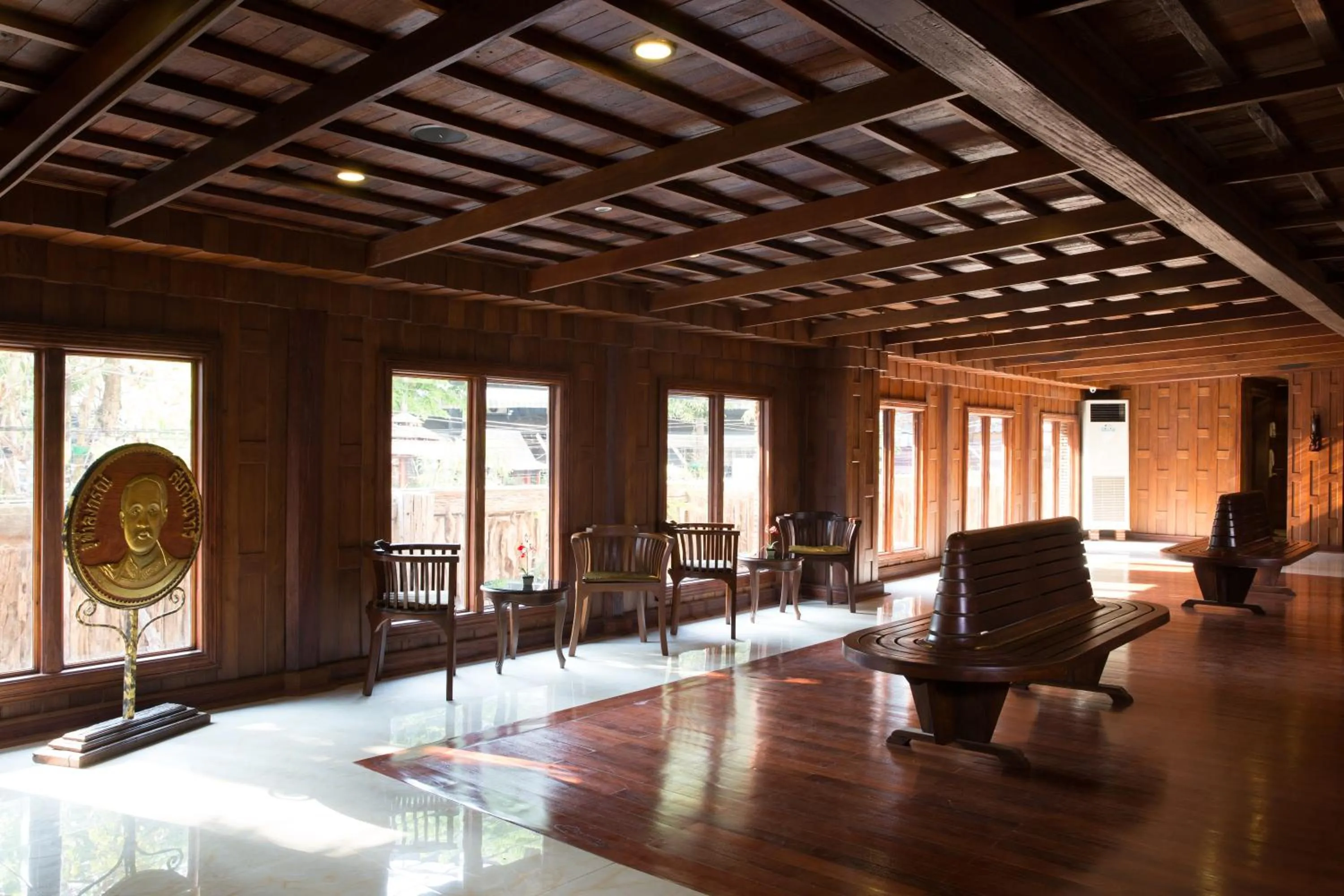 Communal lounge/ TV room in True Siam Rangnam Hotel