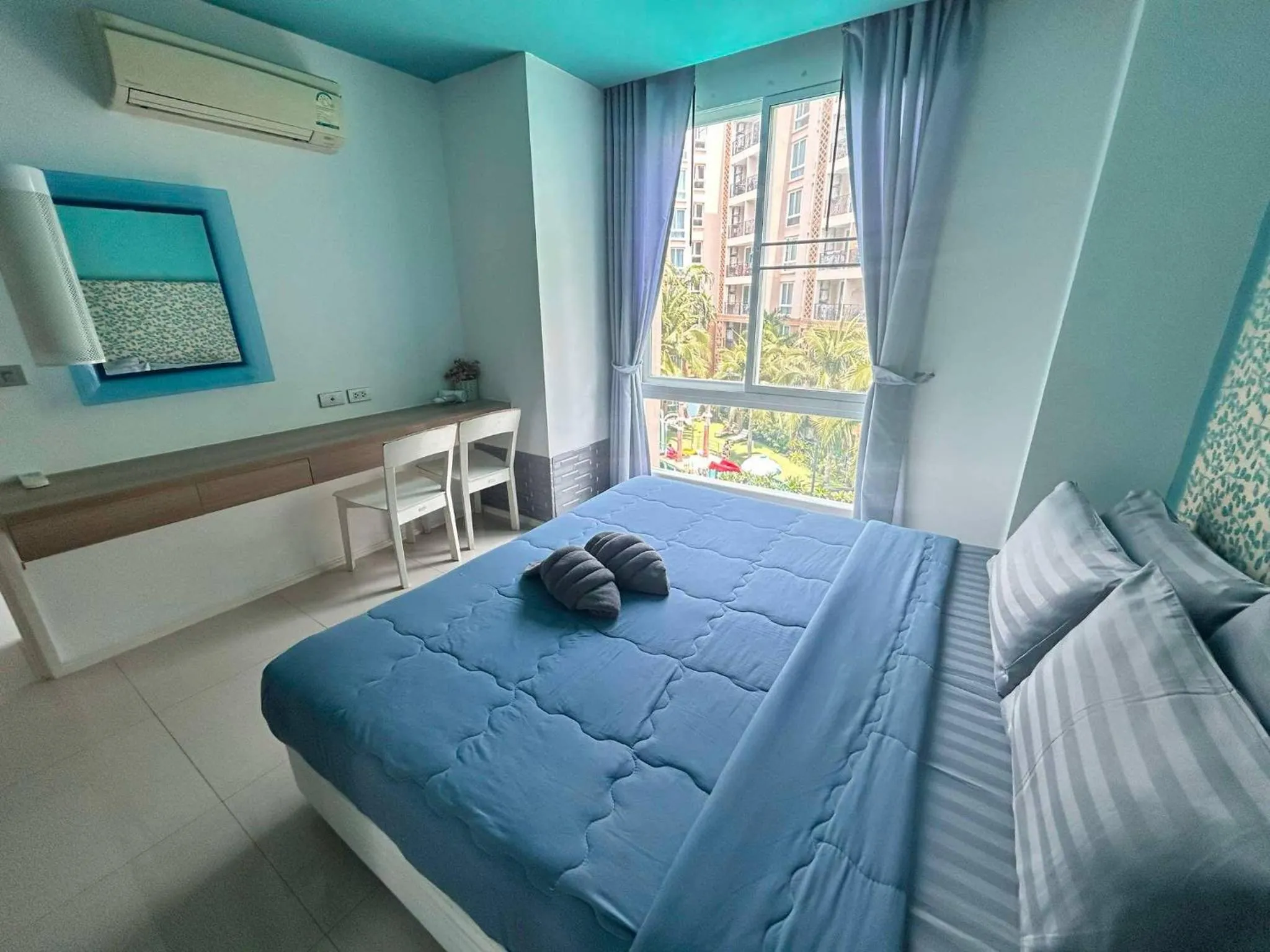 Bed in Atlantic Condo Resort Pattaya by Panisara