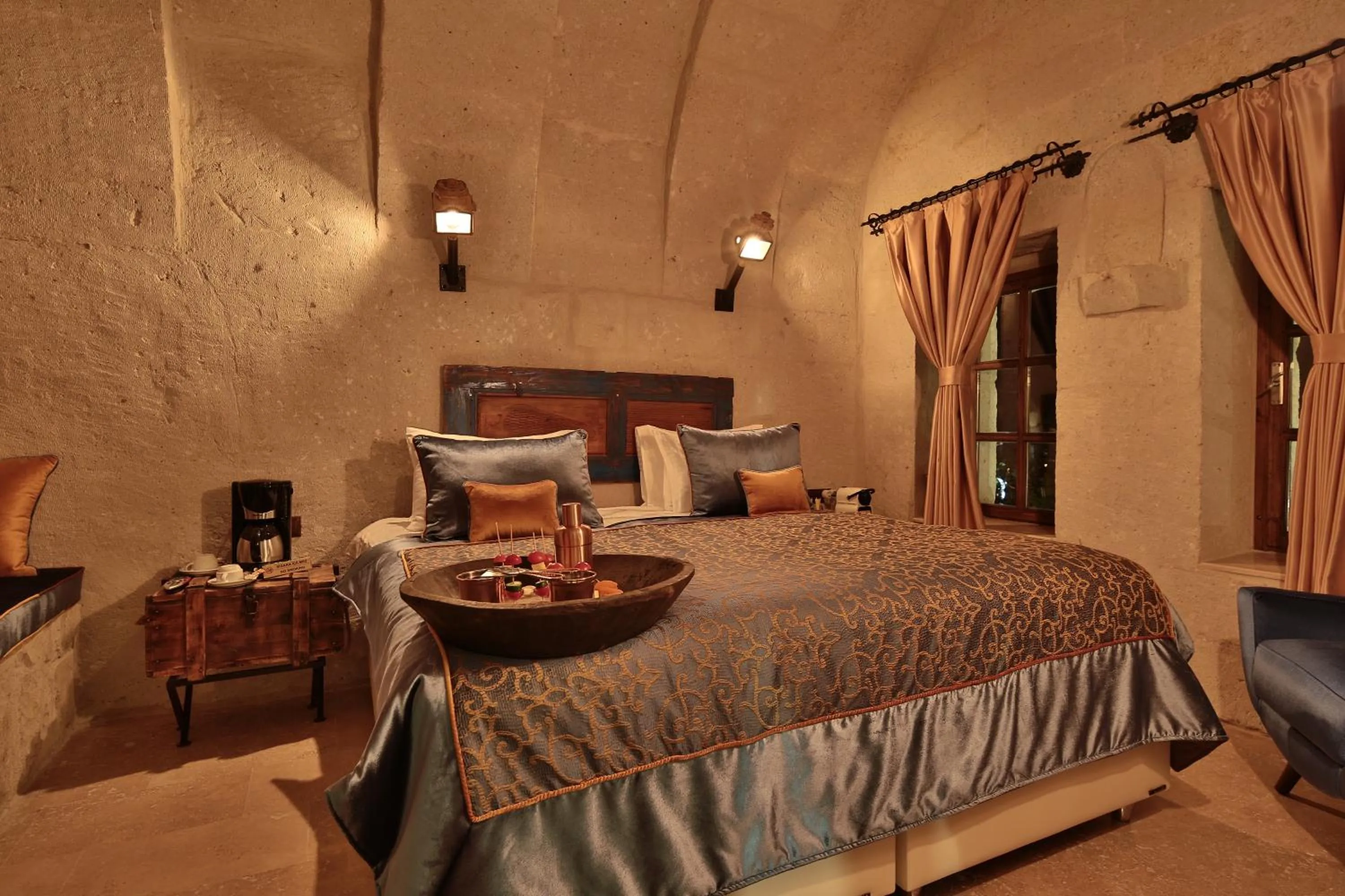 Bed in The Owl Cave Hotel