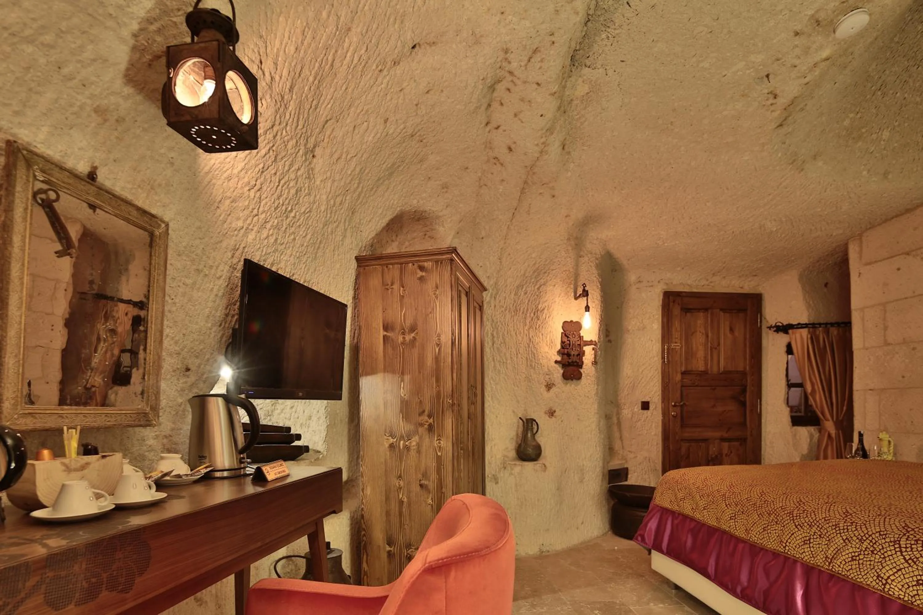 Bed in The Owl Cave Hotel