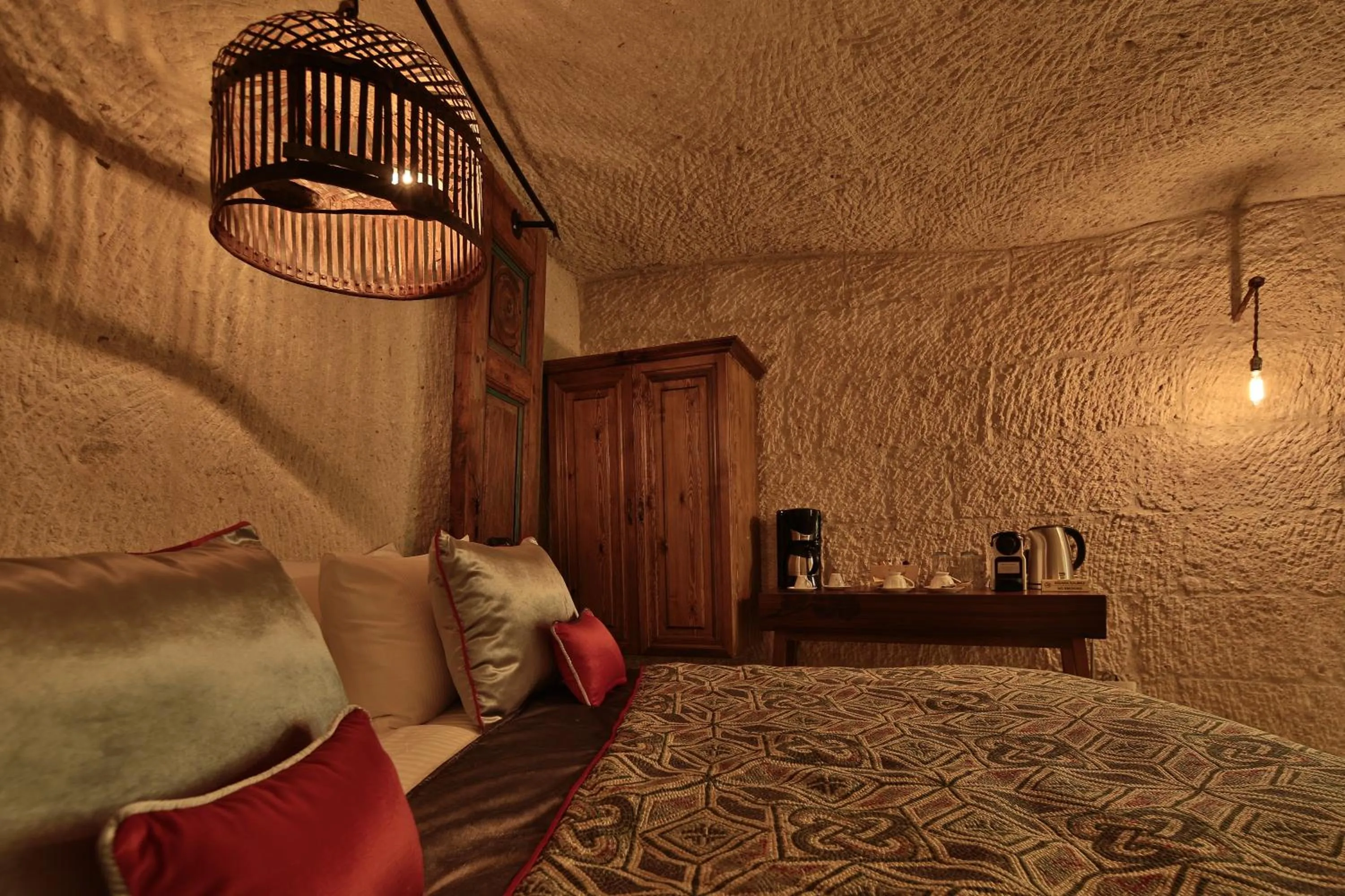 Bed in The Owl Cave Hotel