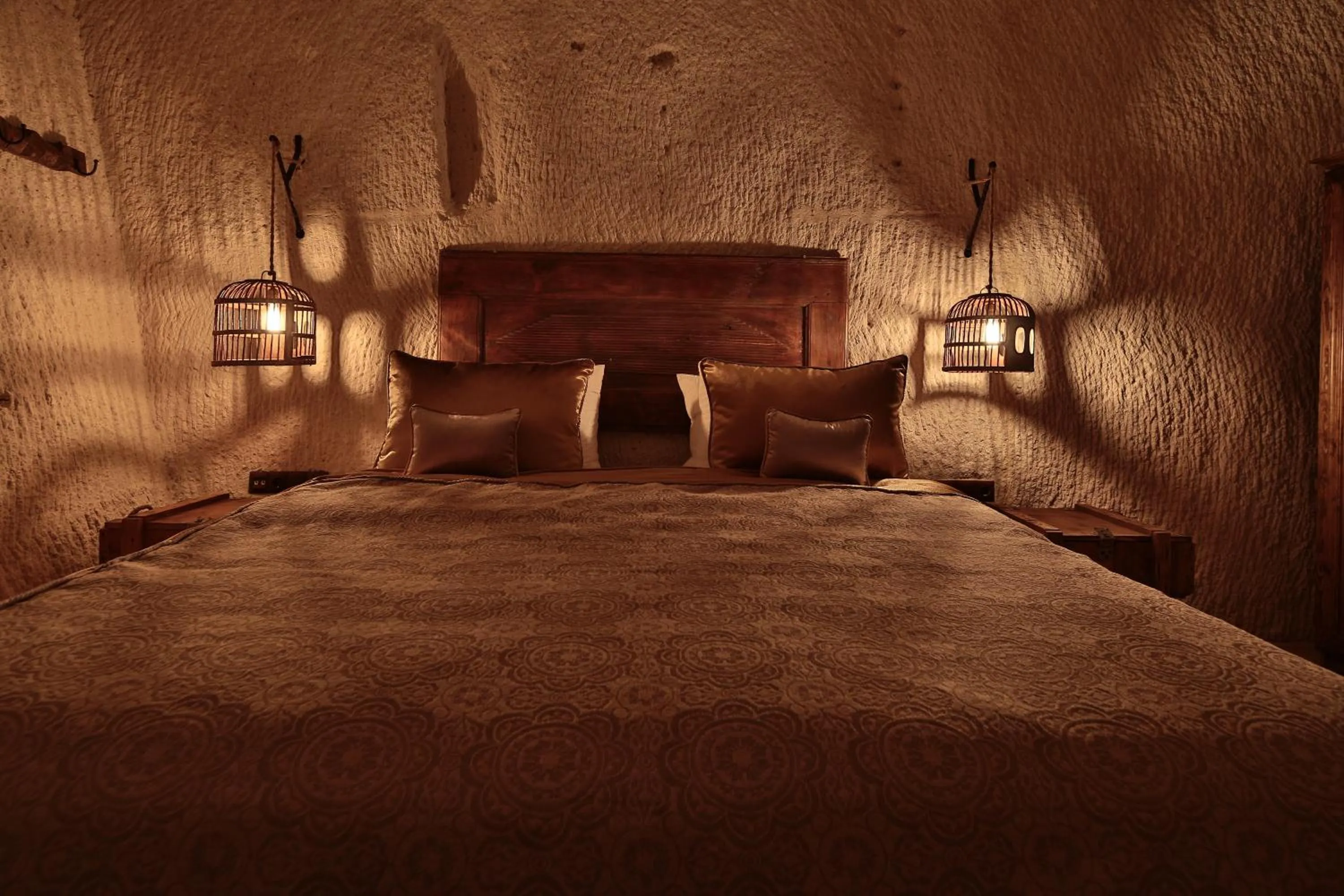 Bed in The Owl Cave Hotel