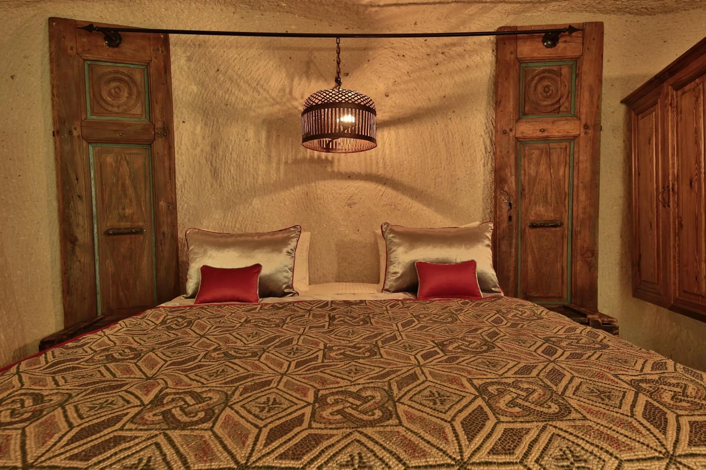 Bed in The Owl Cave Hotel