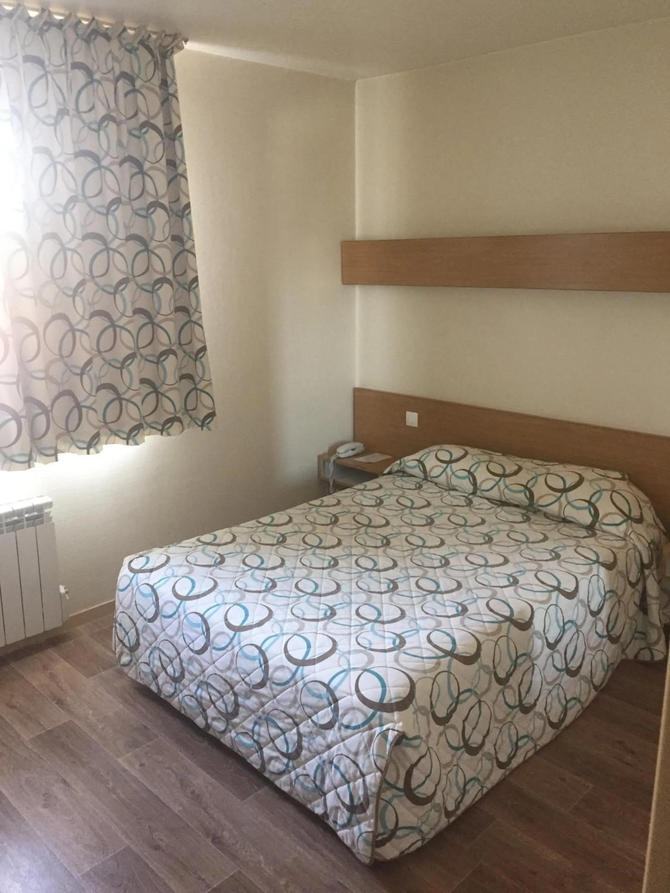 Photo of the whole room, Bed in Hotel Le Boischaut - Citotel Chateauroux