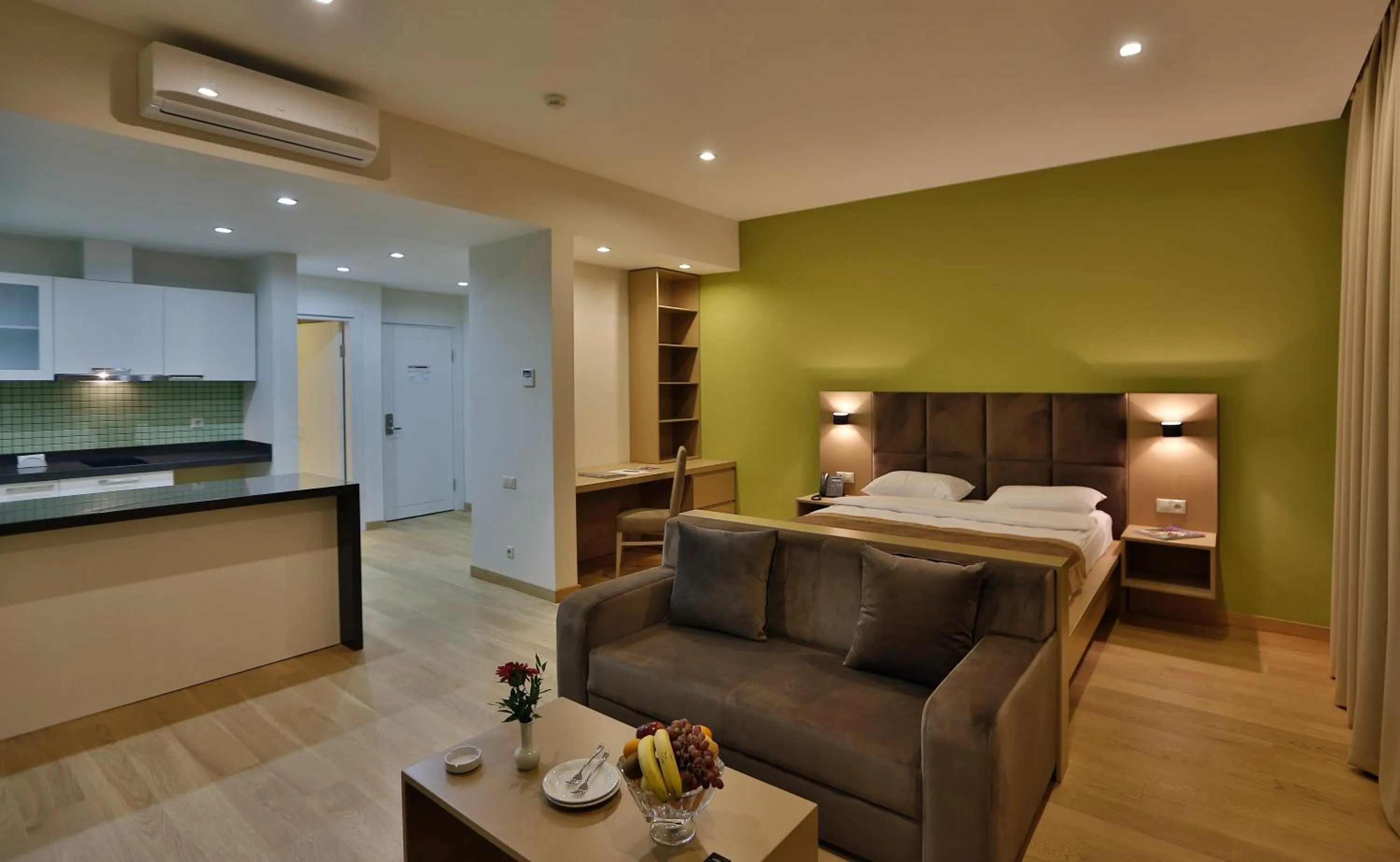 Kitchen or kitchenette, Bed in HomeBridge Hotel Apartments