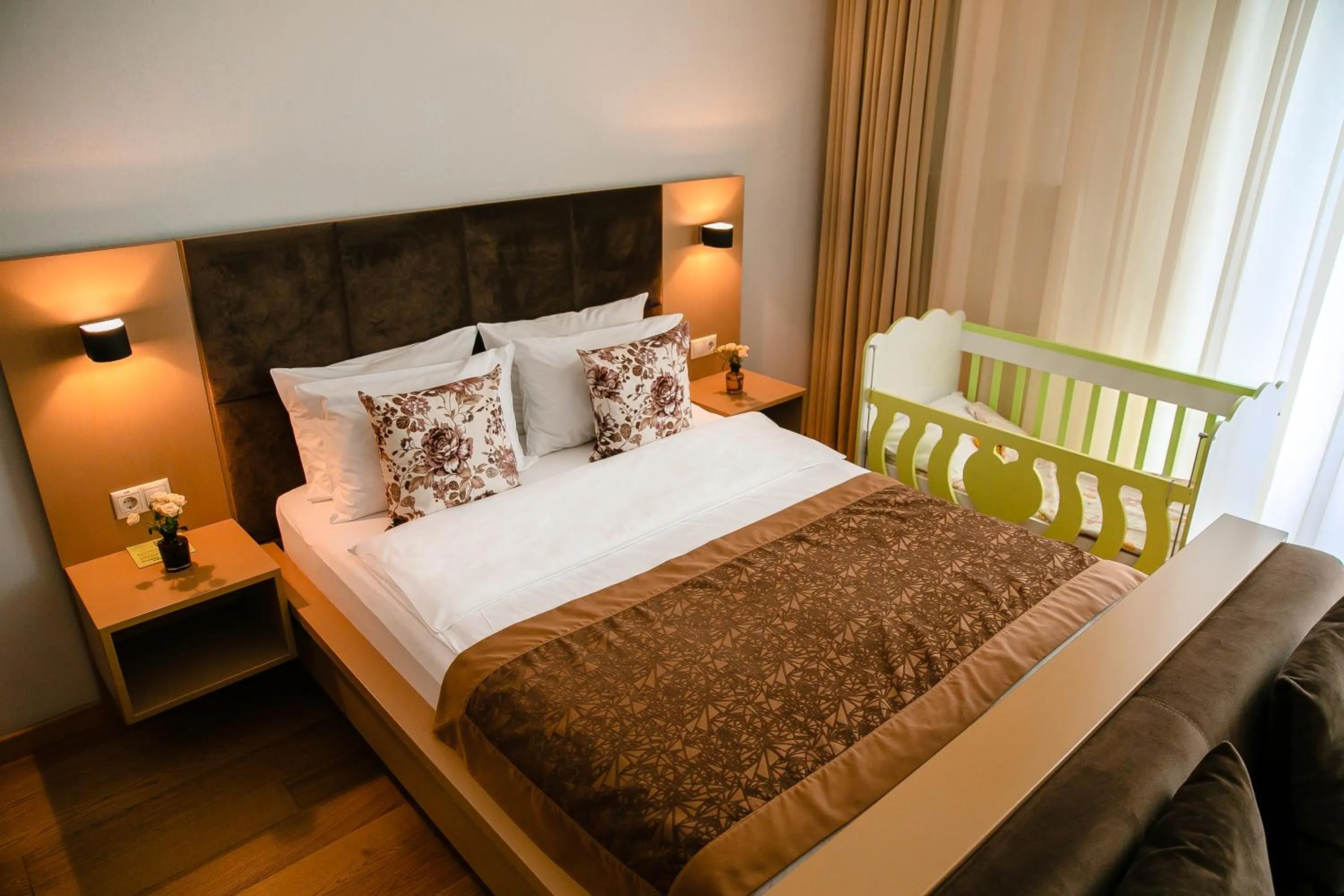 Bed in HomeBridge Hotel Apartments