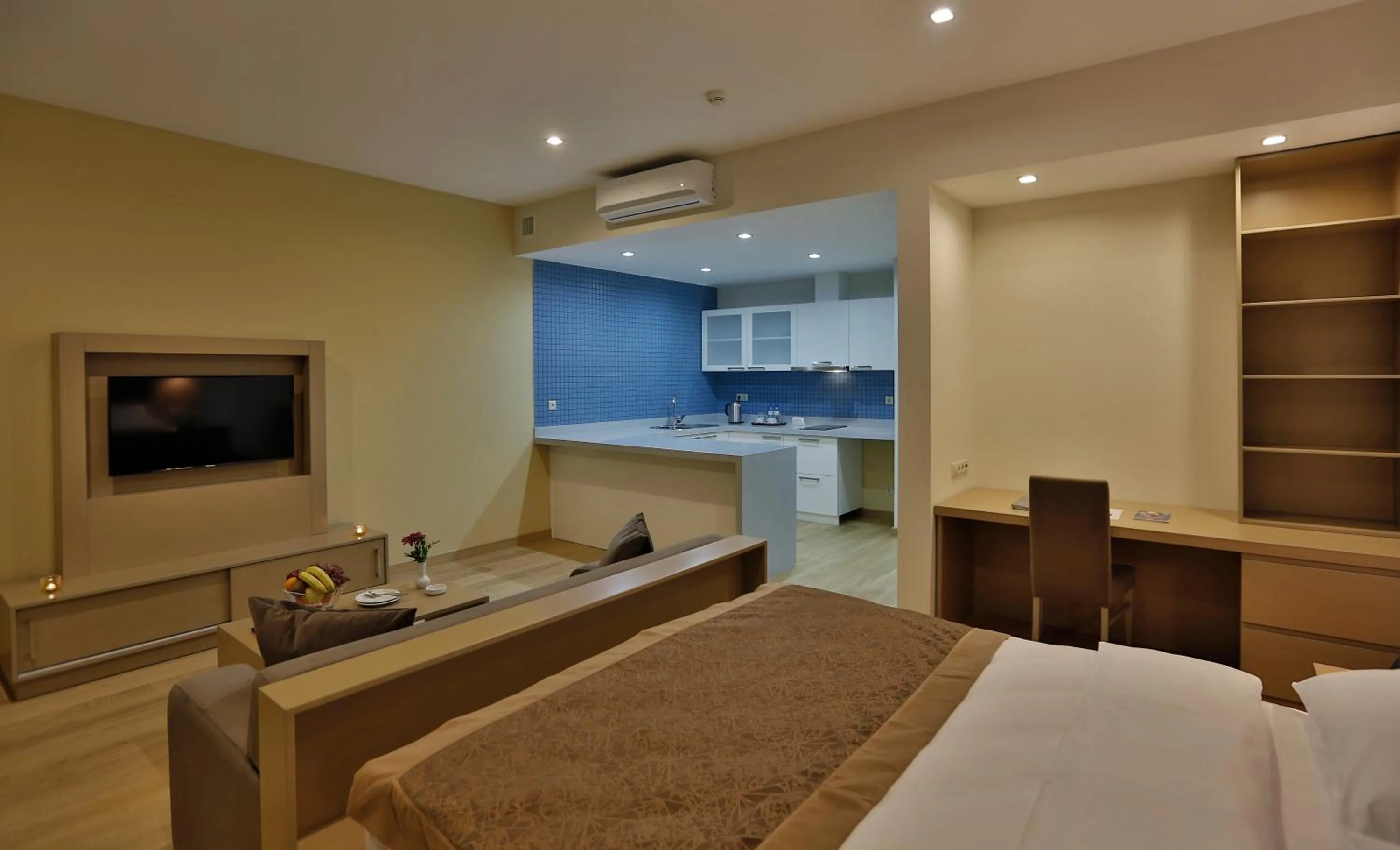 Kitchen or kitchenette, Bed in HomeBridge Hotel Apartments