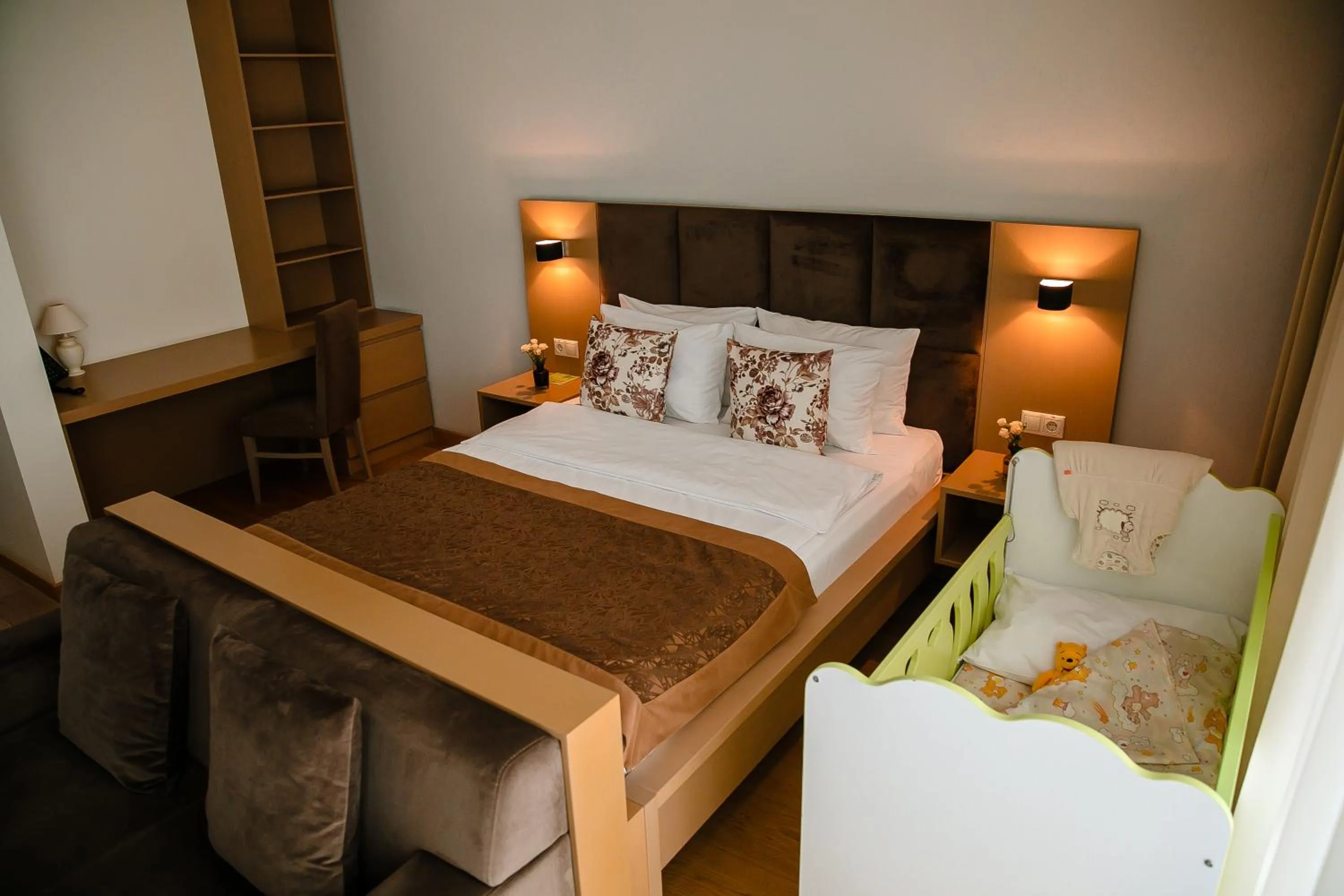 Bed in HomeBridge Hotel Apartments