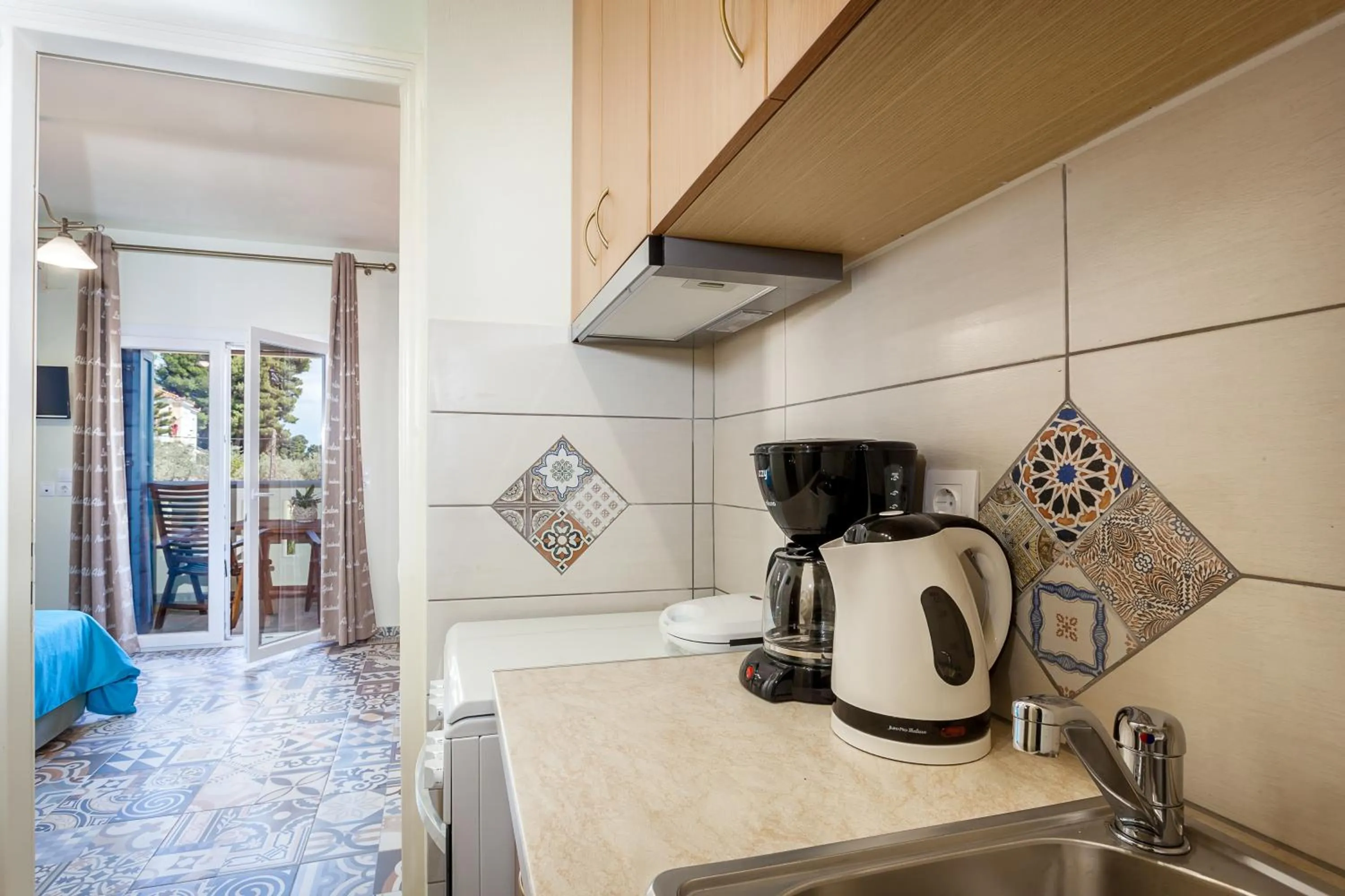 Kitchen or kitchenette in Stafylos Suites & Boutique hotel