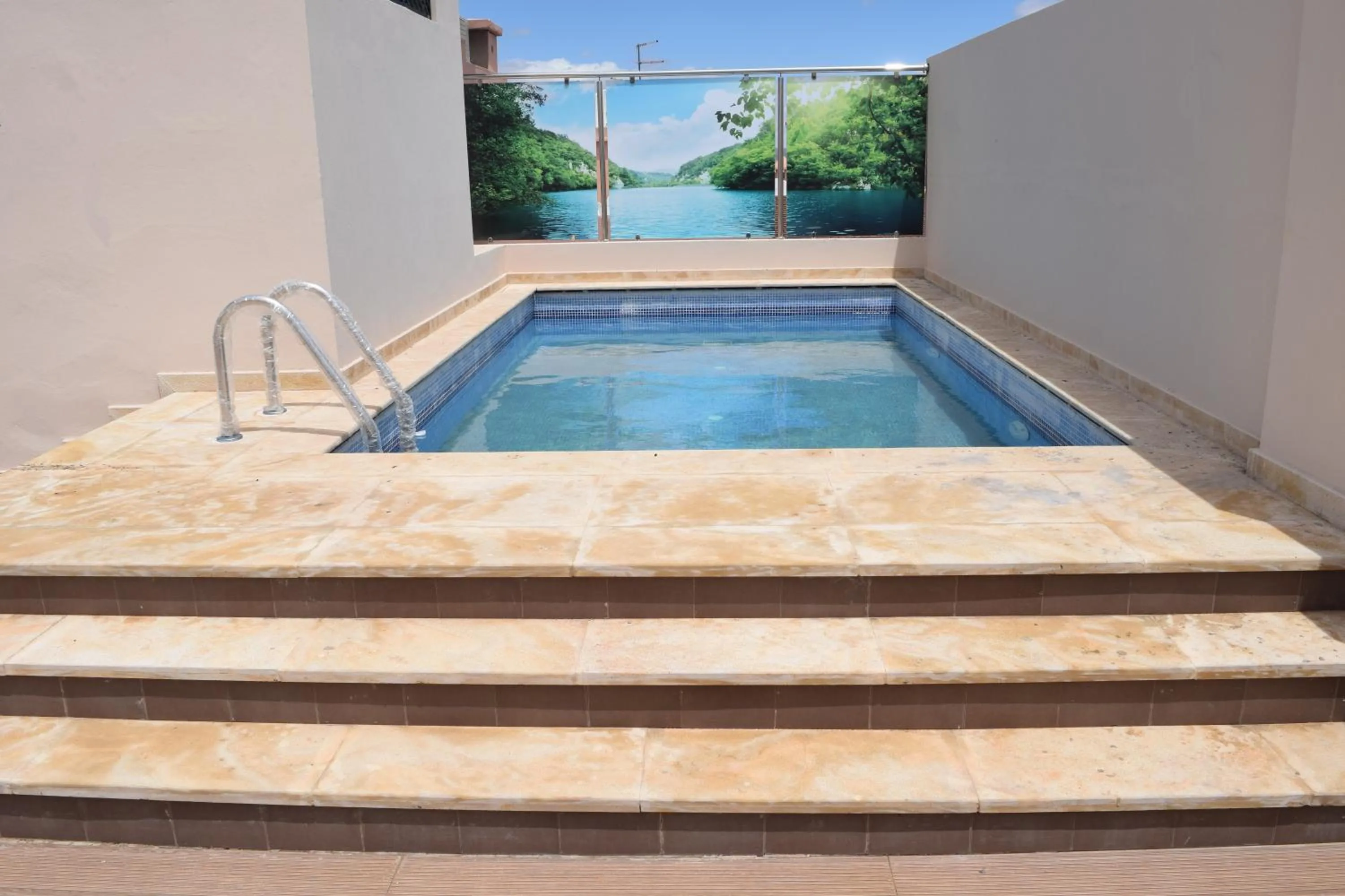 Swimming pool in Hôtel Teranga & Spa