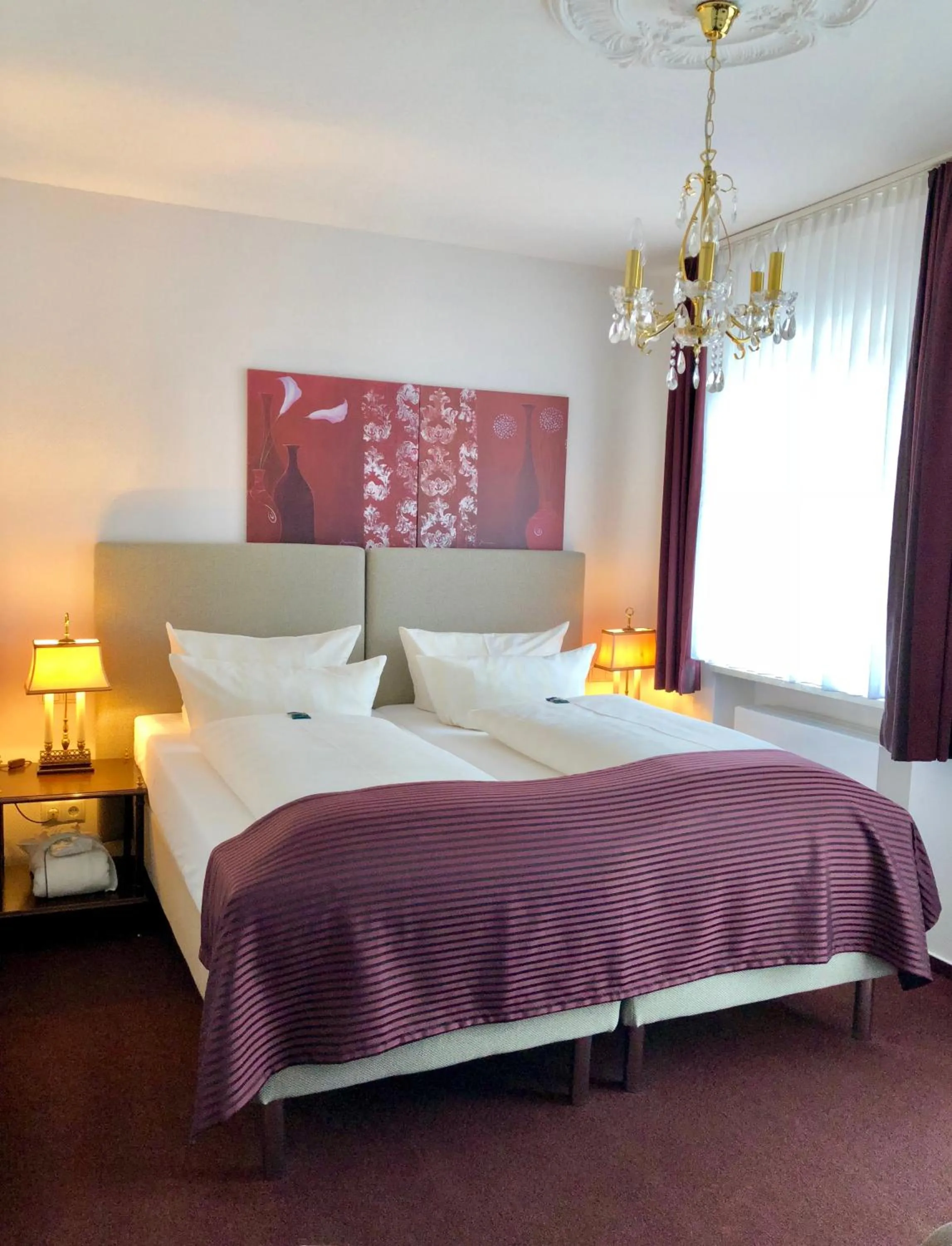 Photo of the whole room, Bed in Hotel Sylter Blaumuschel