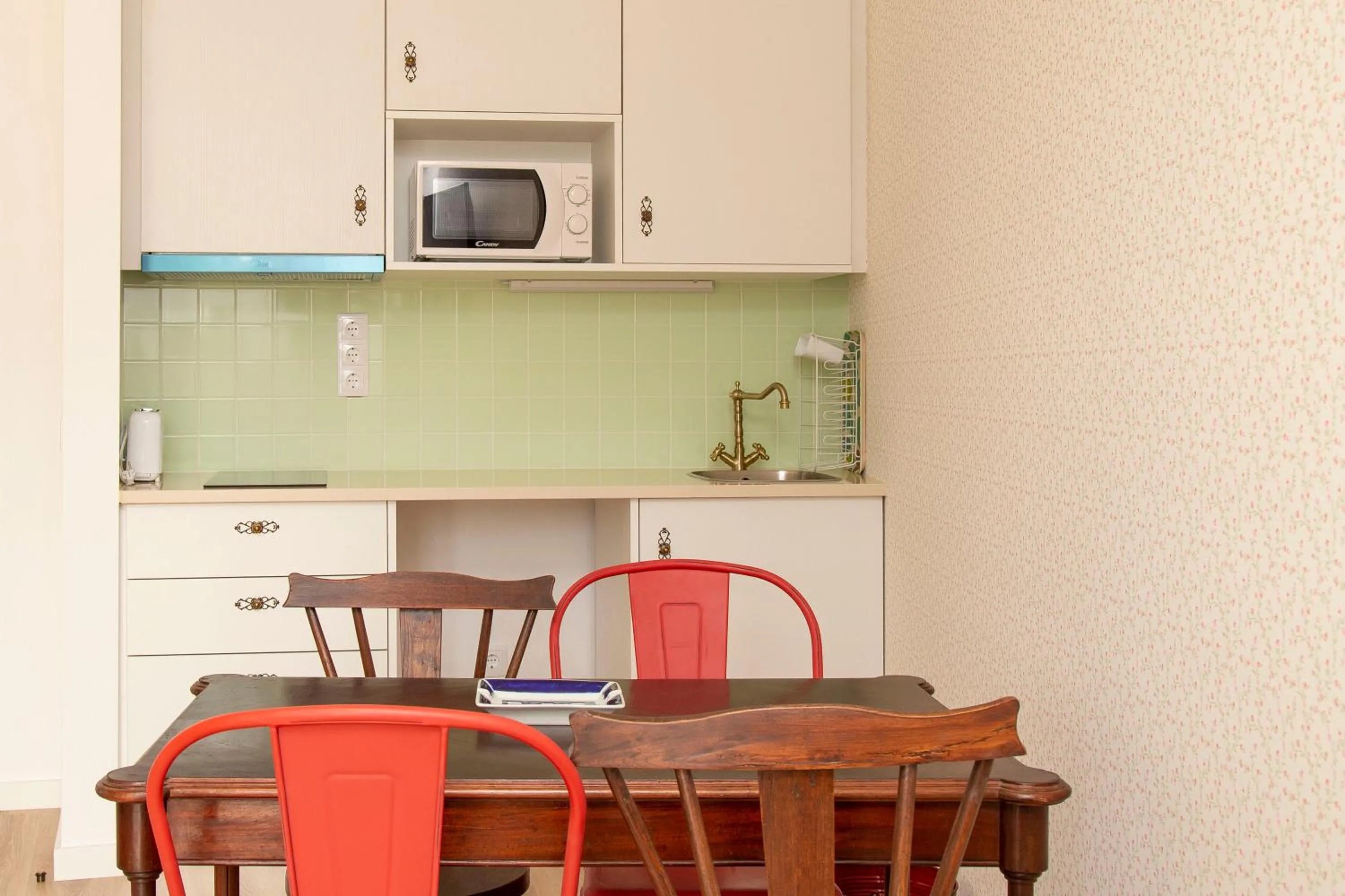Kitchen or kitchenette in Aires da Serra Hotel