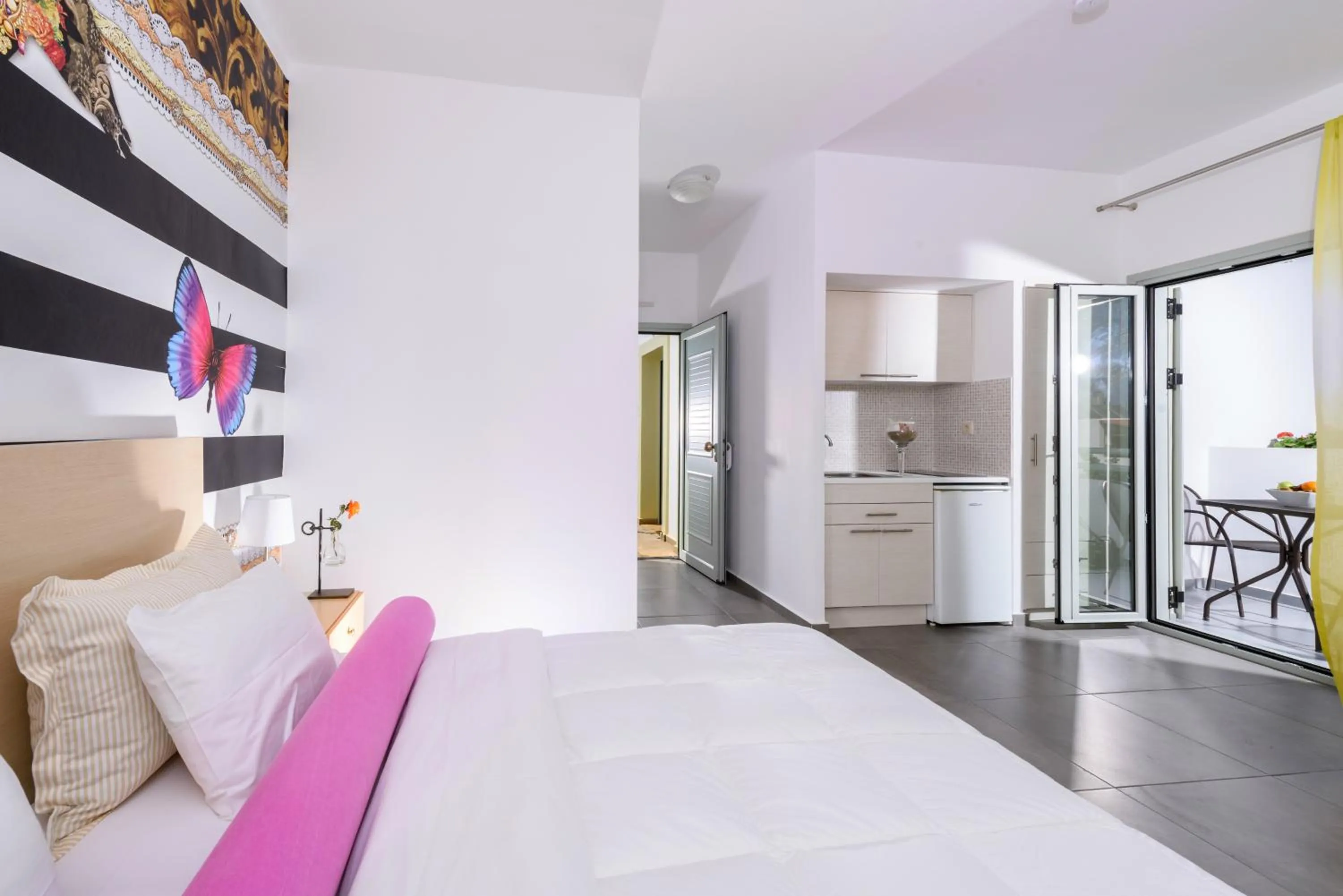 Bed in Angela Studios Apartments