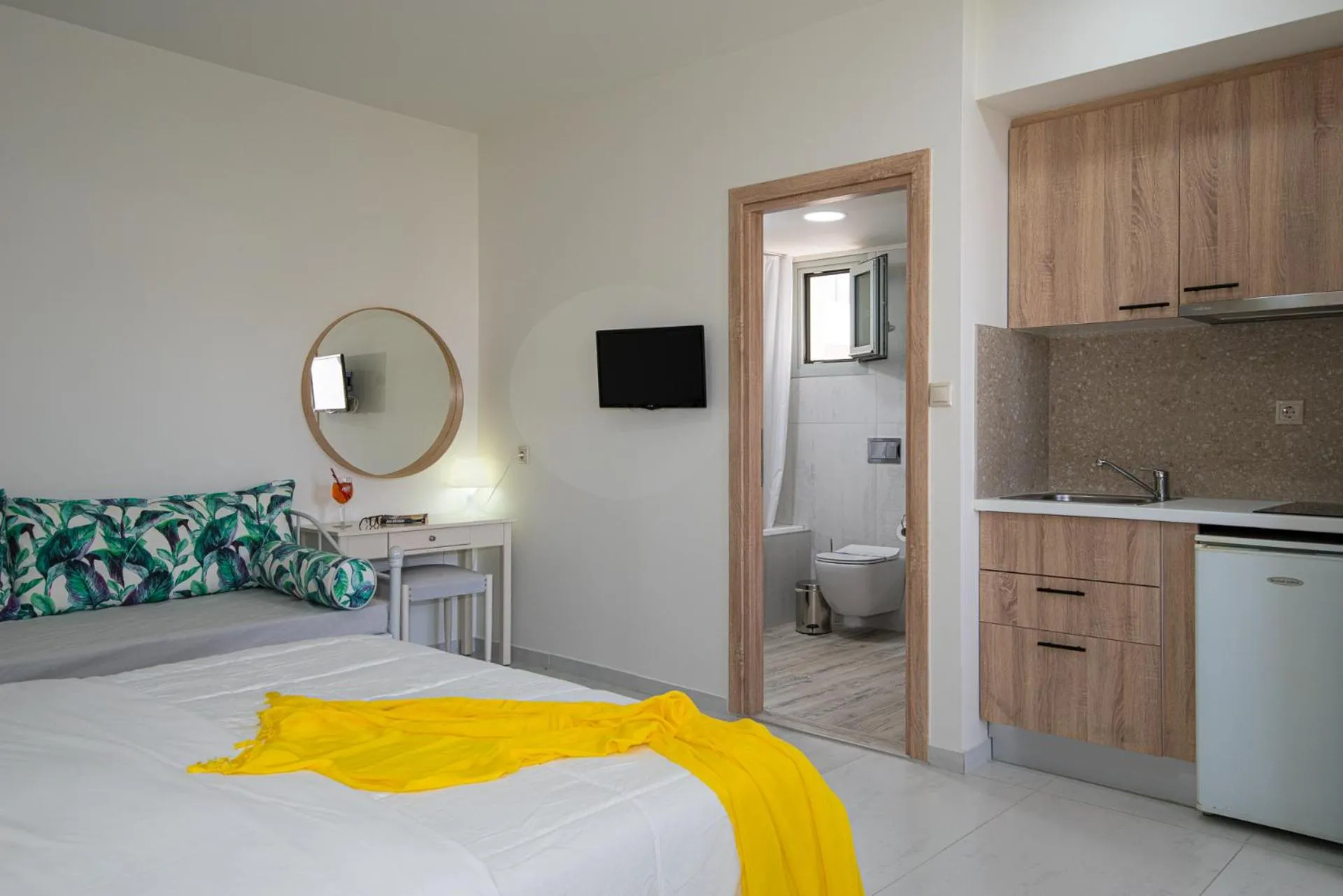 Bed in Angela Studios Apartments