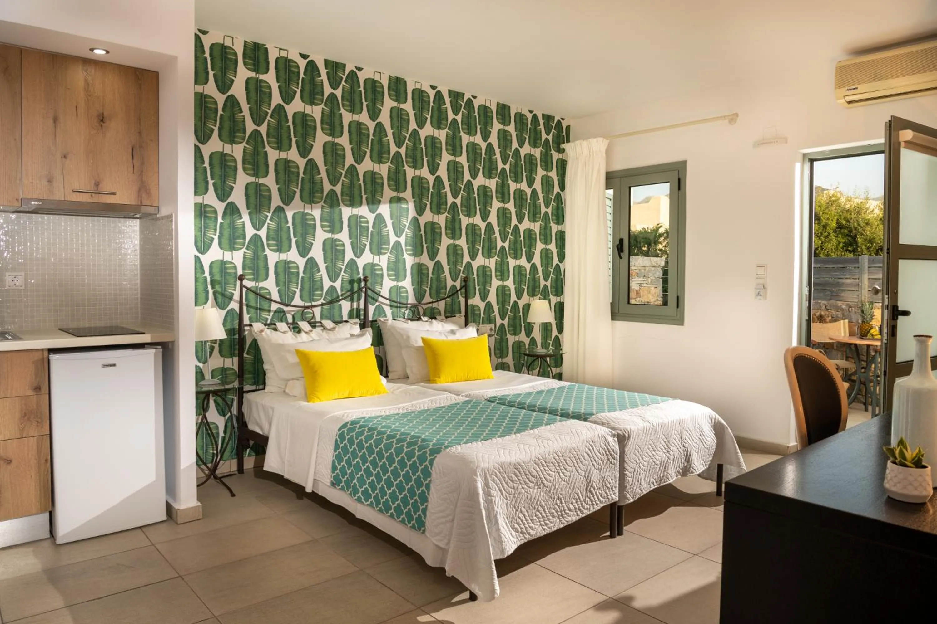 Bed in Angela Studios Apartments