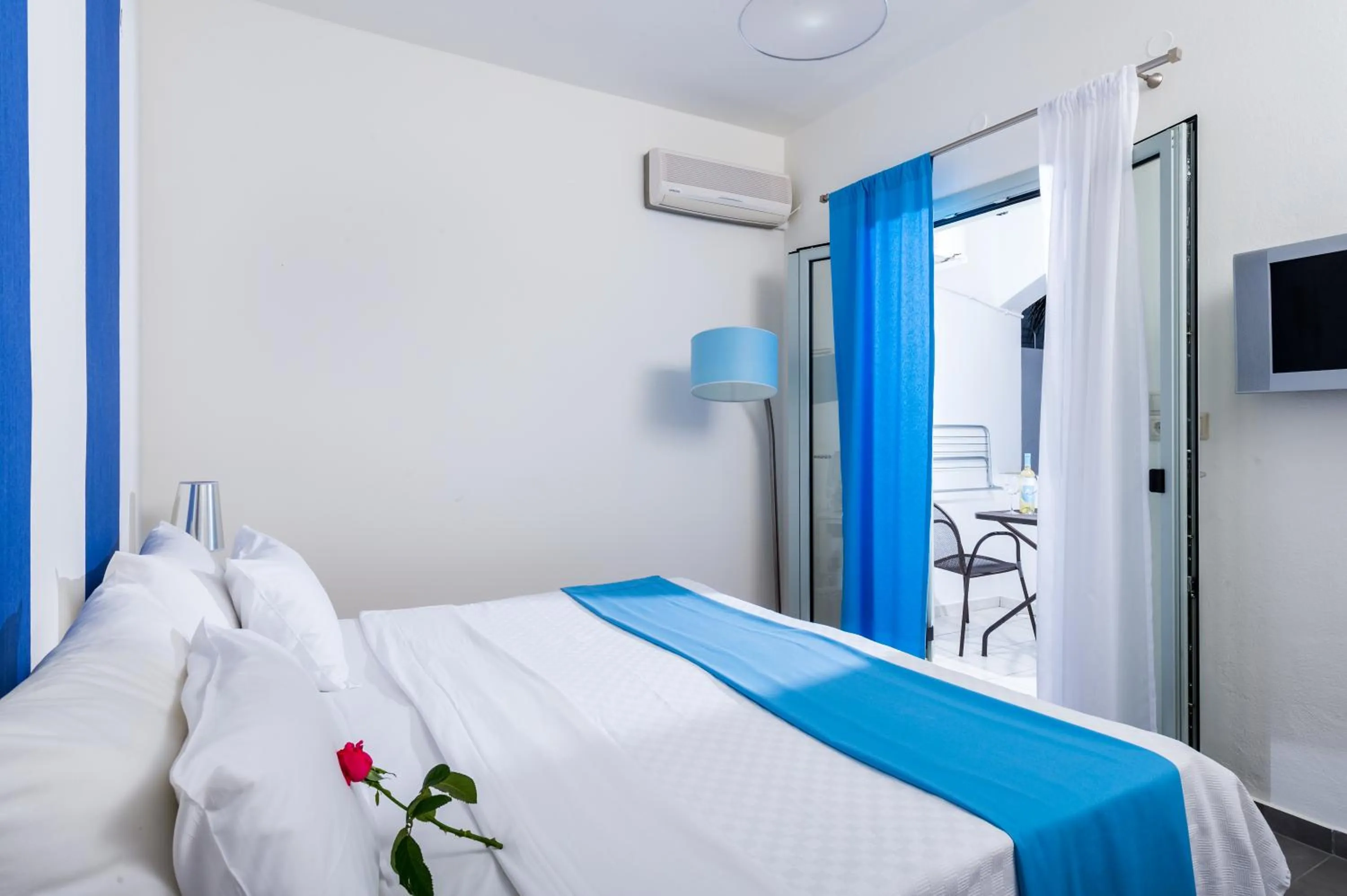 Bed in Angela Studios Apartments