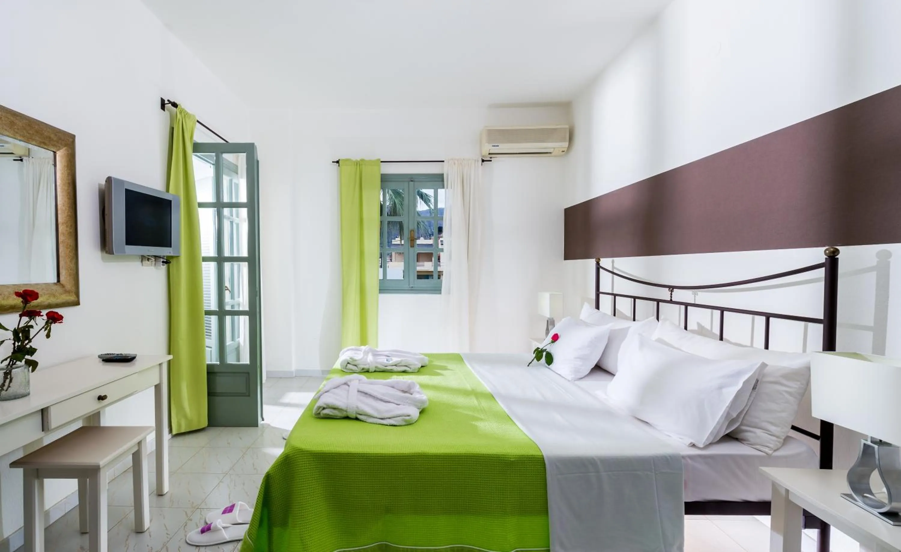 Bed in Angela Studios Apartments