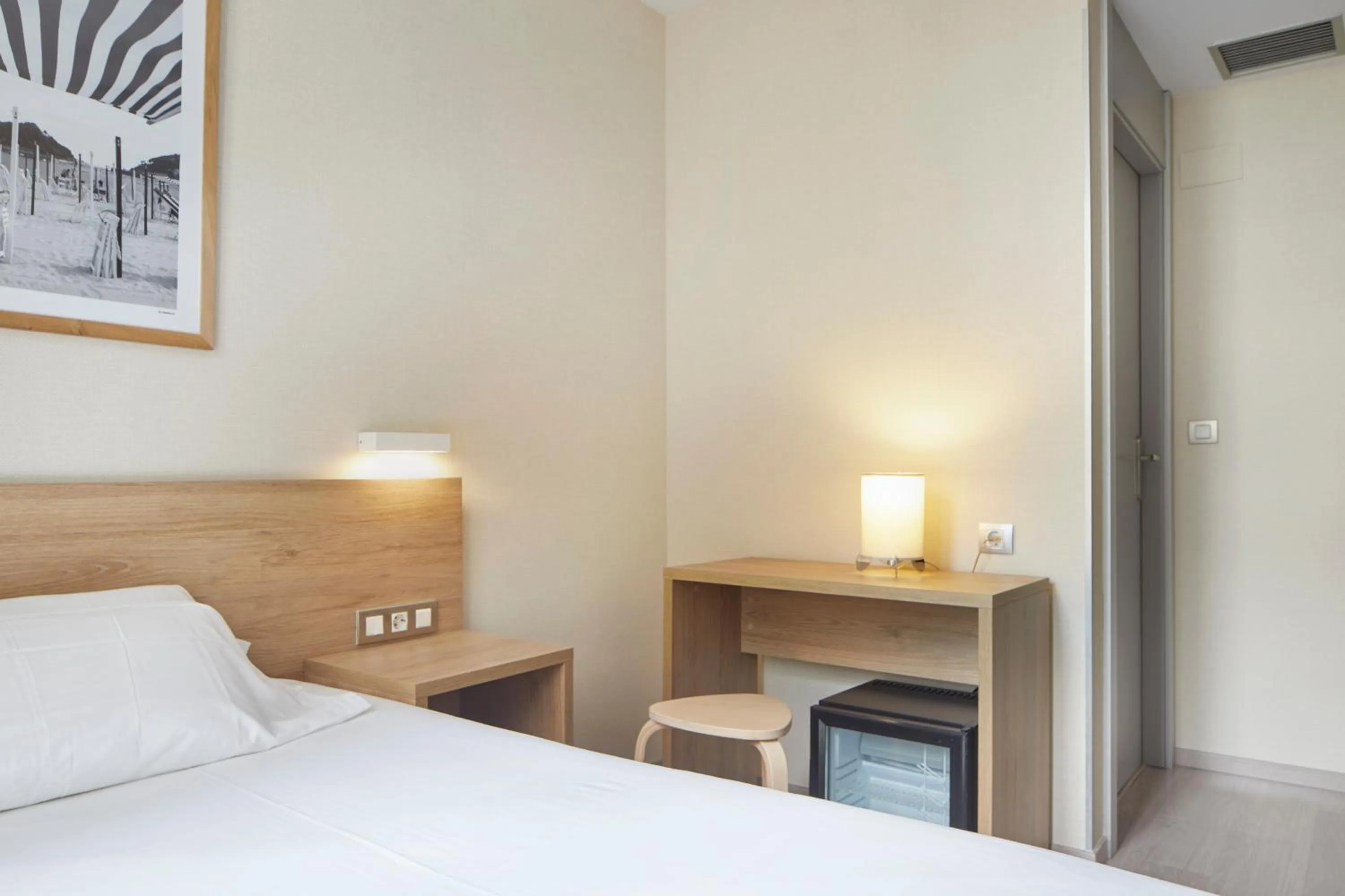 Bed in Welcome Gros Hotel