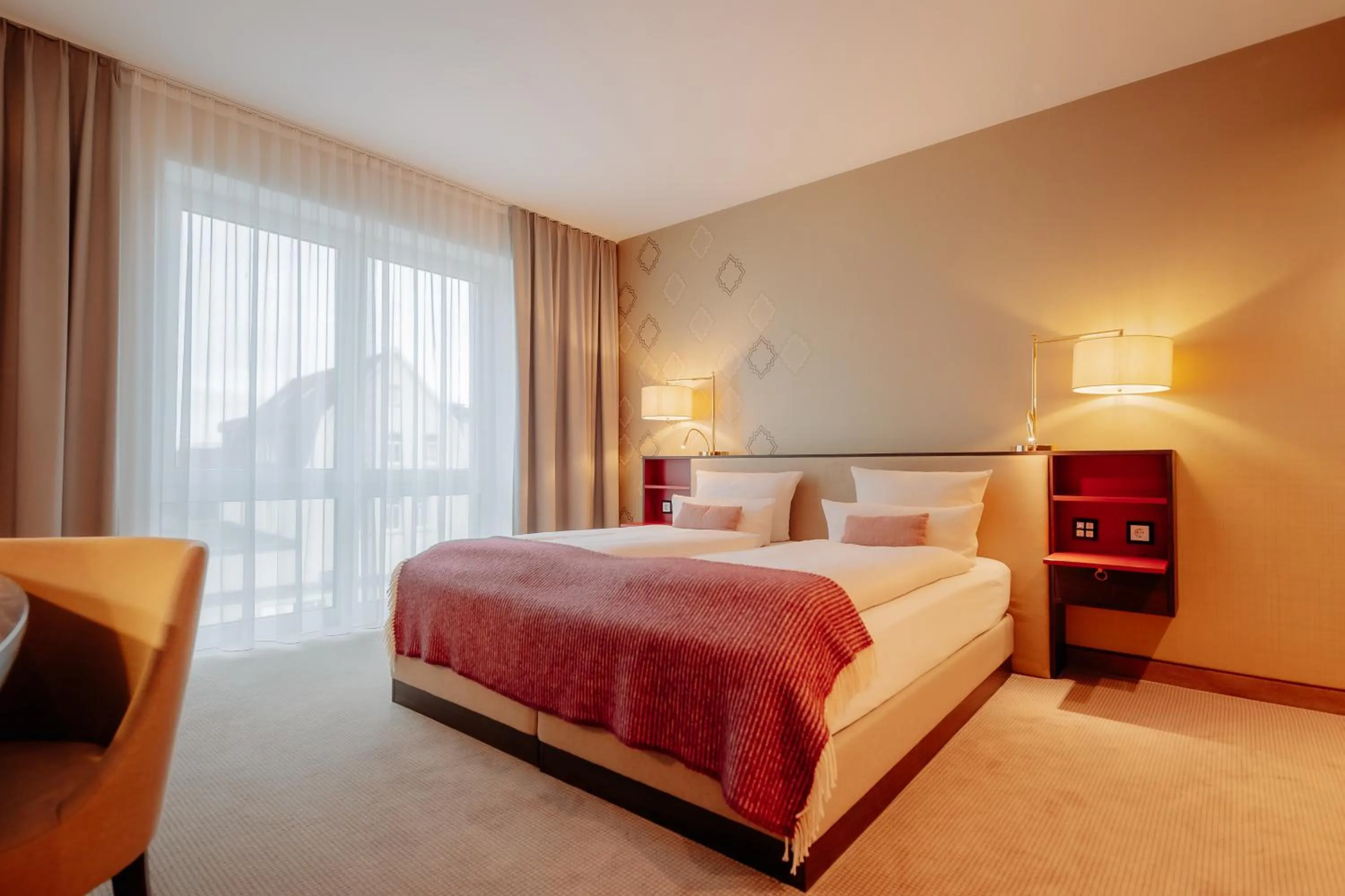 Photo of the whole room, Bed in LOOKEN INN Lingen by Hackmann