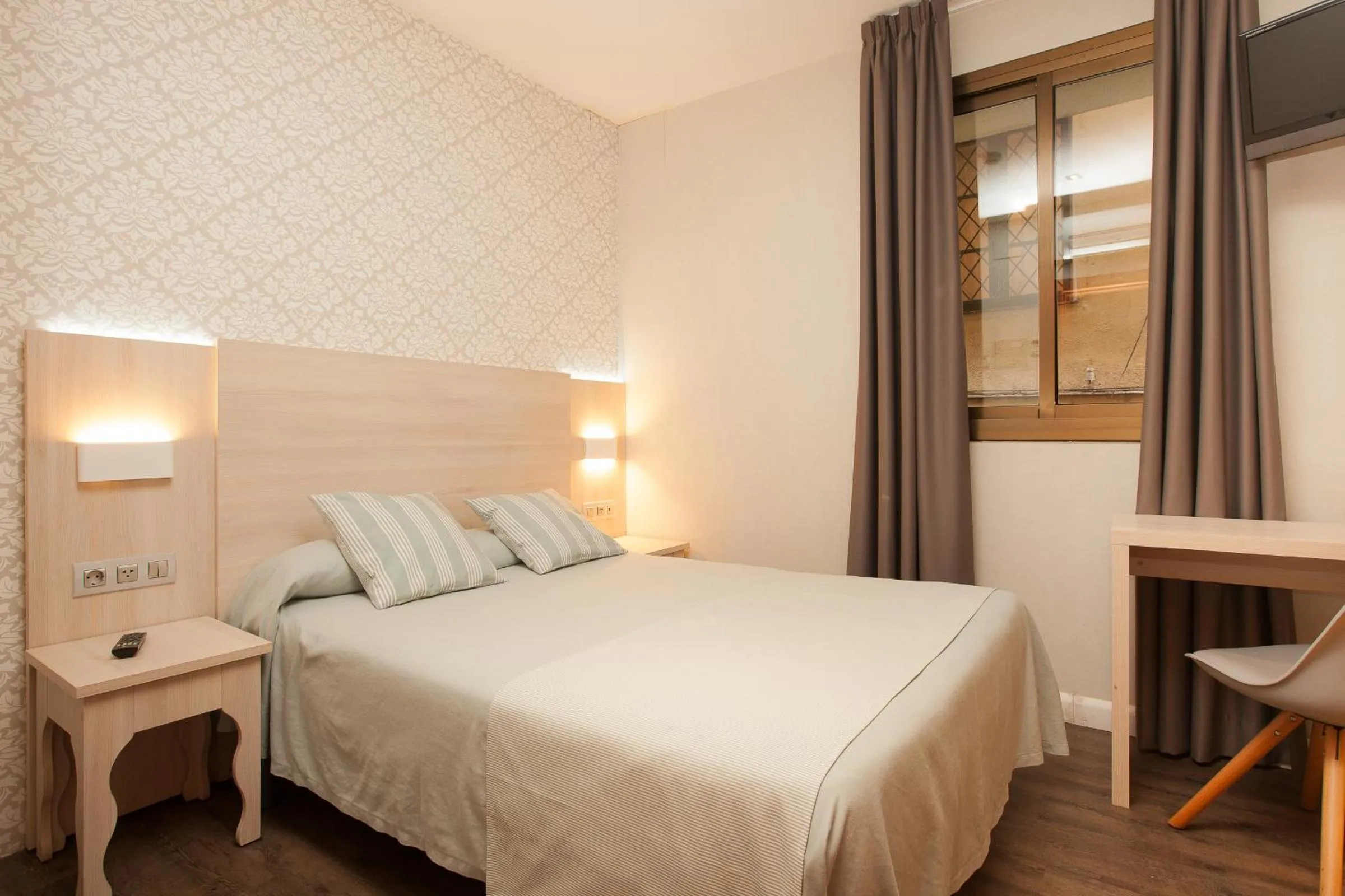 Photo of the whole room, Bed in Hostal Fernando