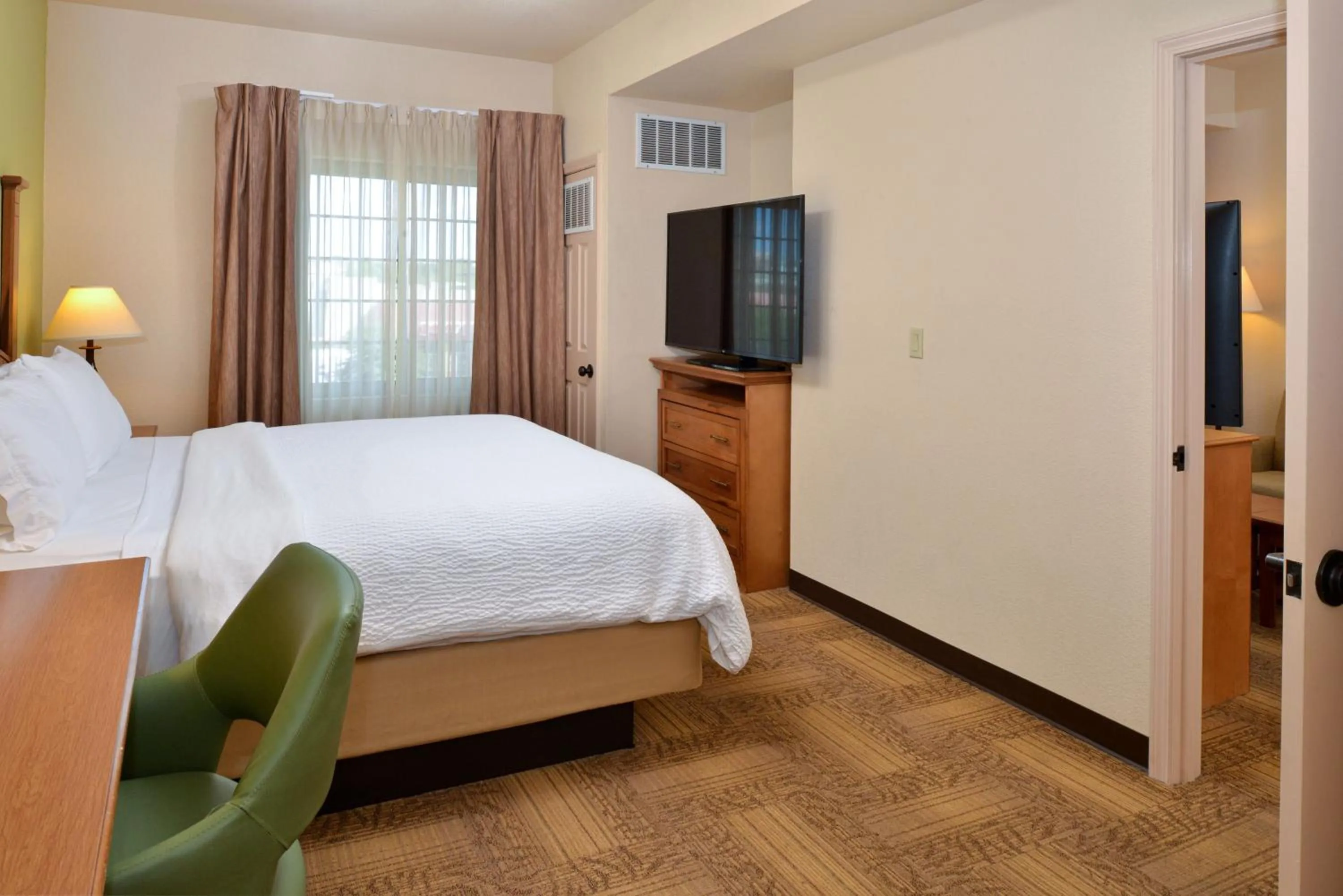 Photo of the whole room, Bed in Staybridge Suites Las Cruces by IHG