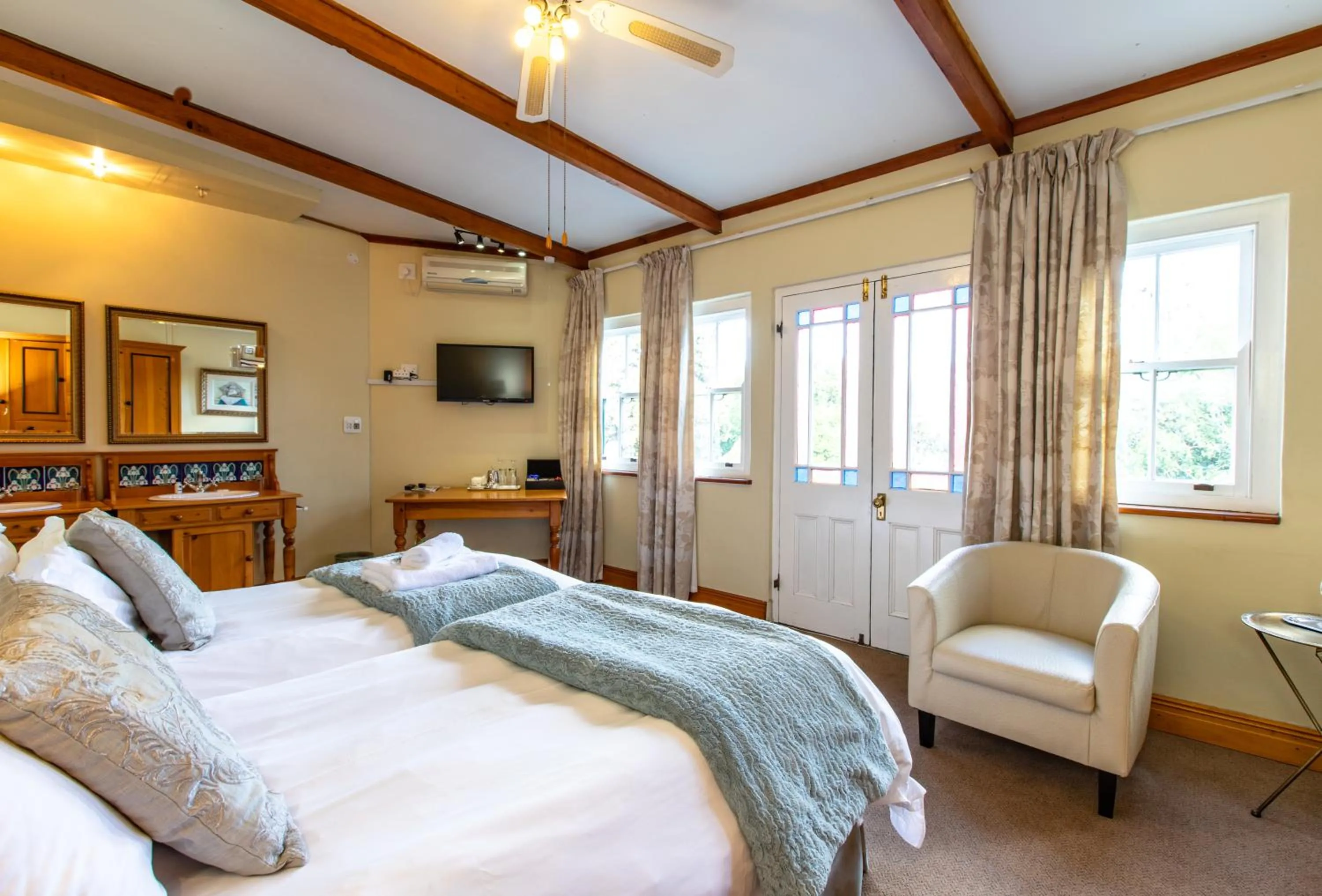 Bed in Evergreen Manor and Spa