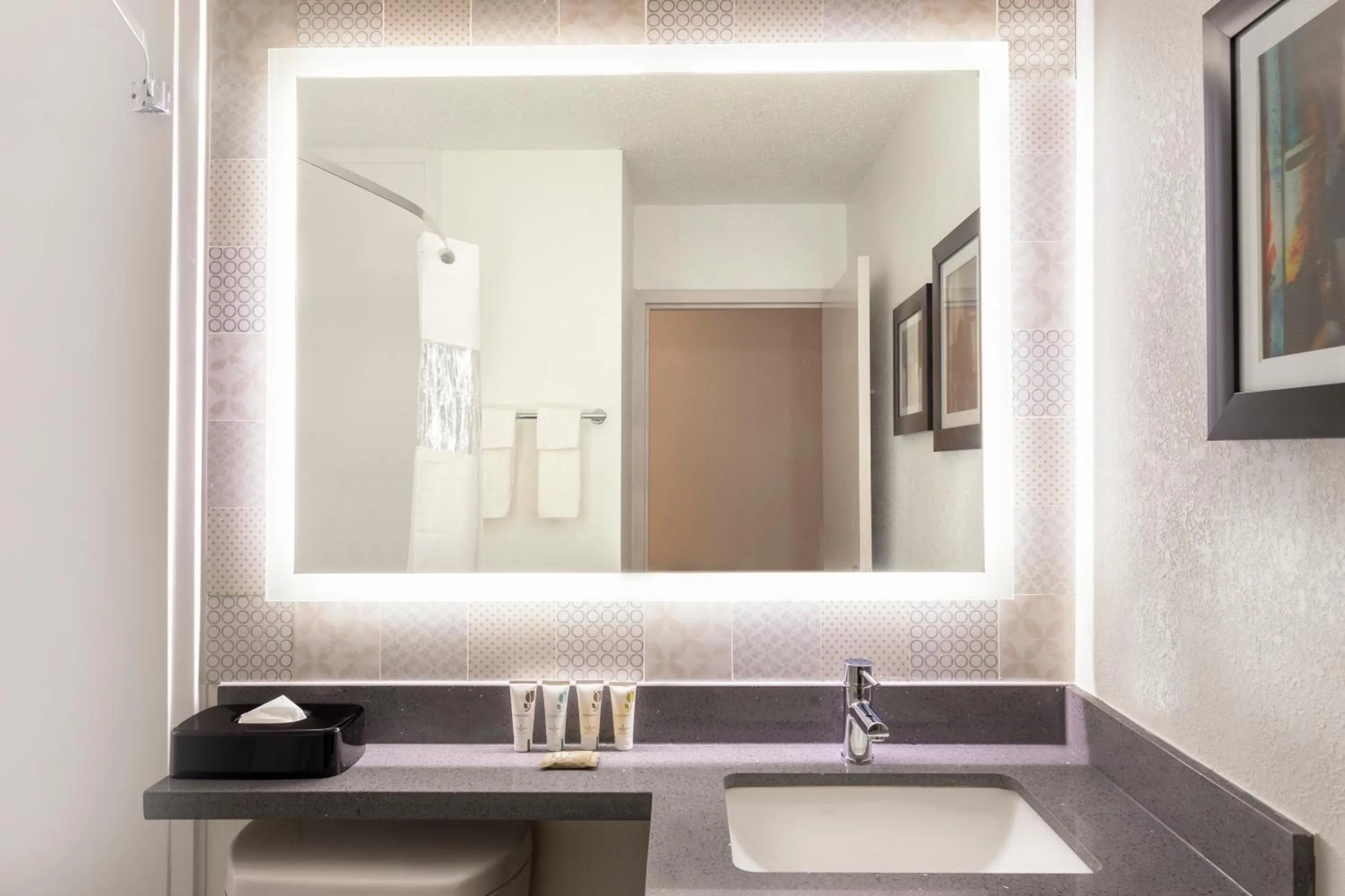 Bathroom in Country Inn & Suites by Radisson, North Little Rock, AR