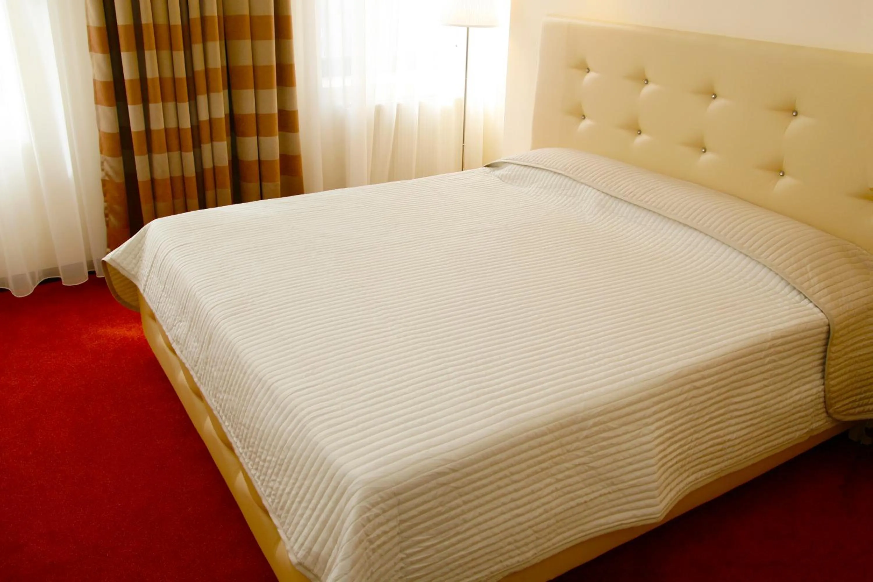 Bed in Capitol Hotel