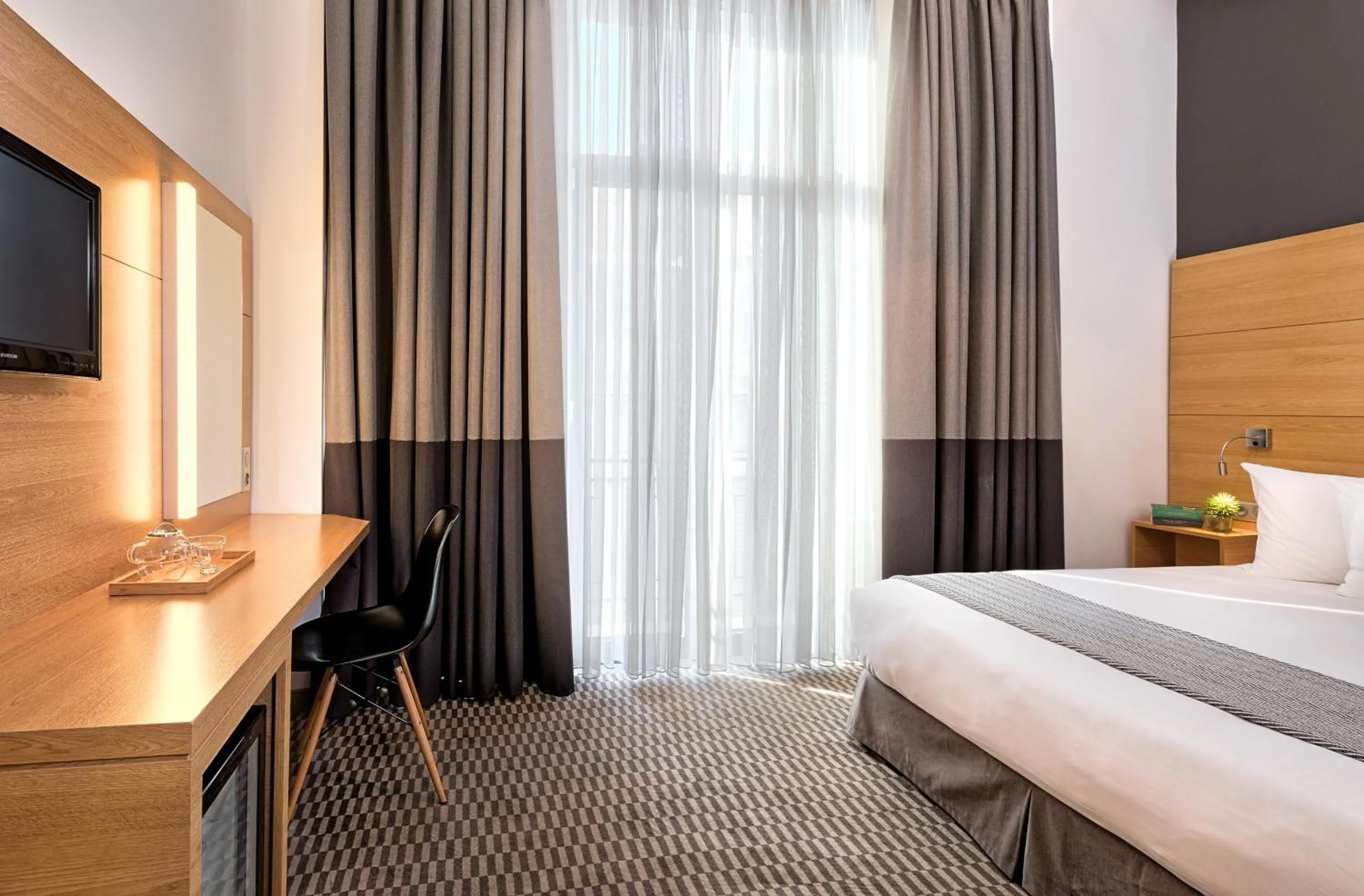 Bed in Aegli Hotel Volos