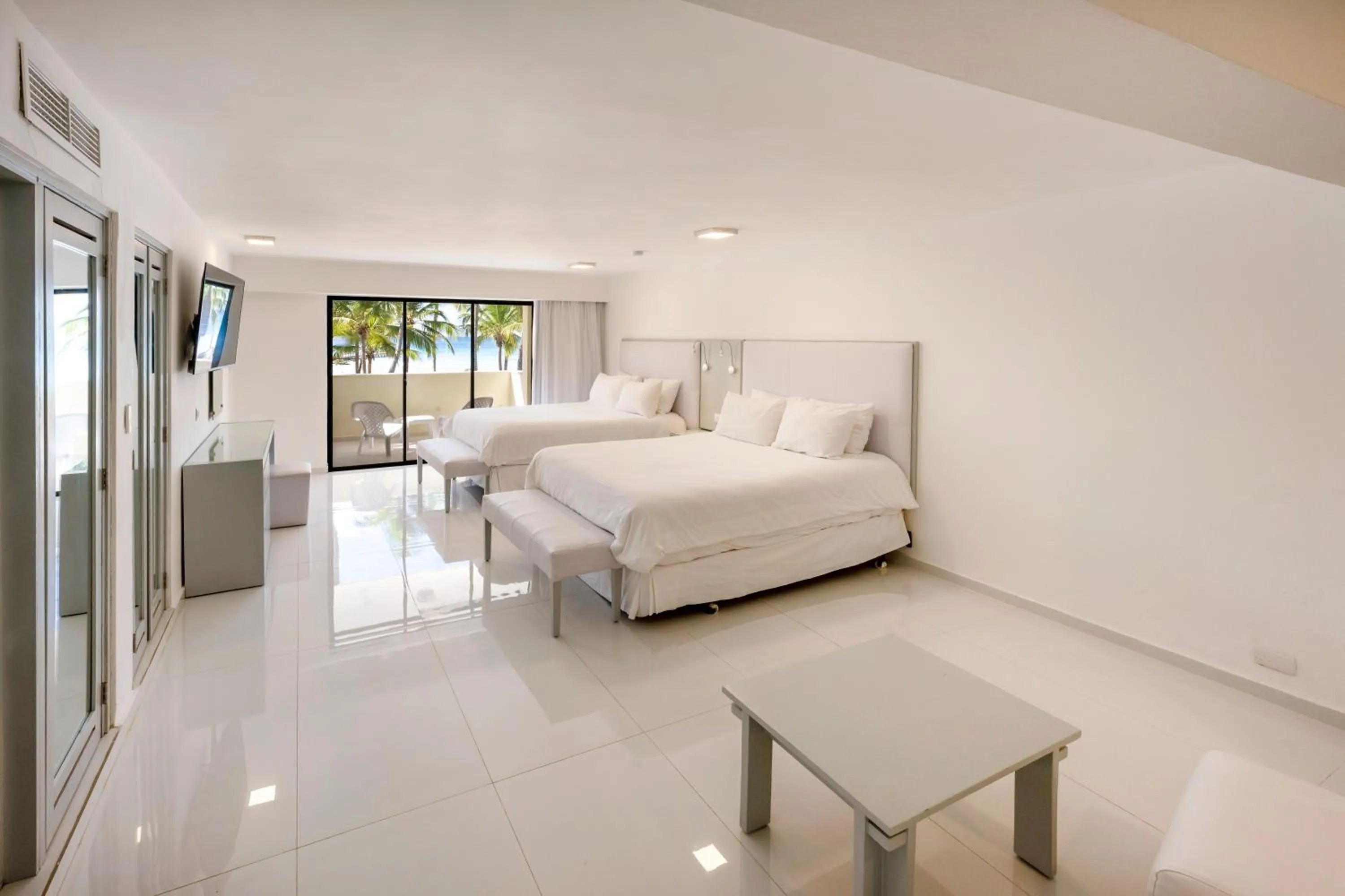 Bed in Viva Dominicus Beach by Wyndham, A Trademark All Inclusive