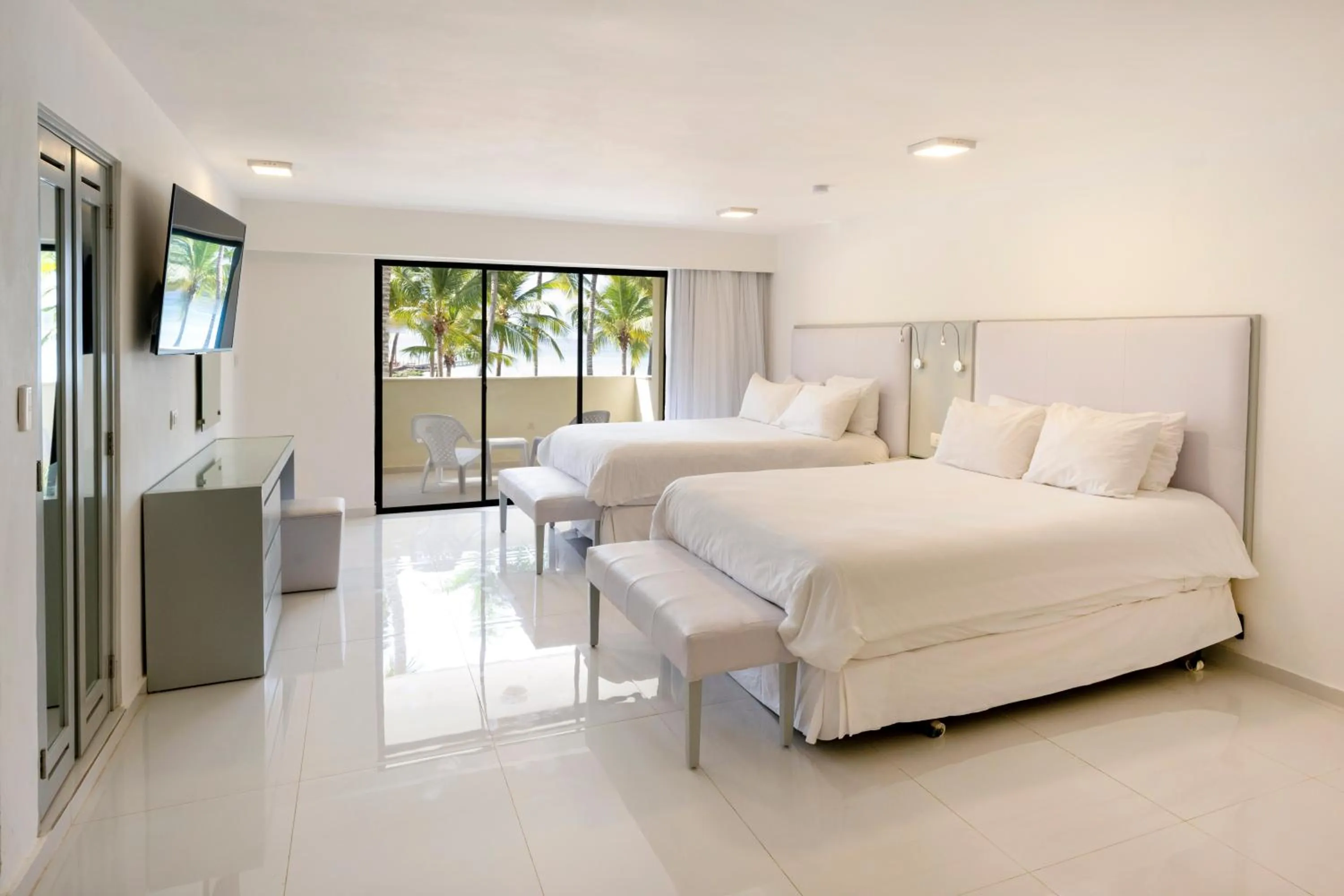 Bed in Viva Dominicus Beach by Wyndham, A Trademark All Inclusive
