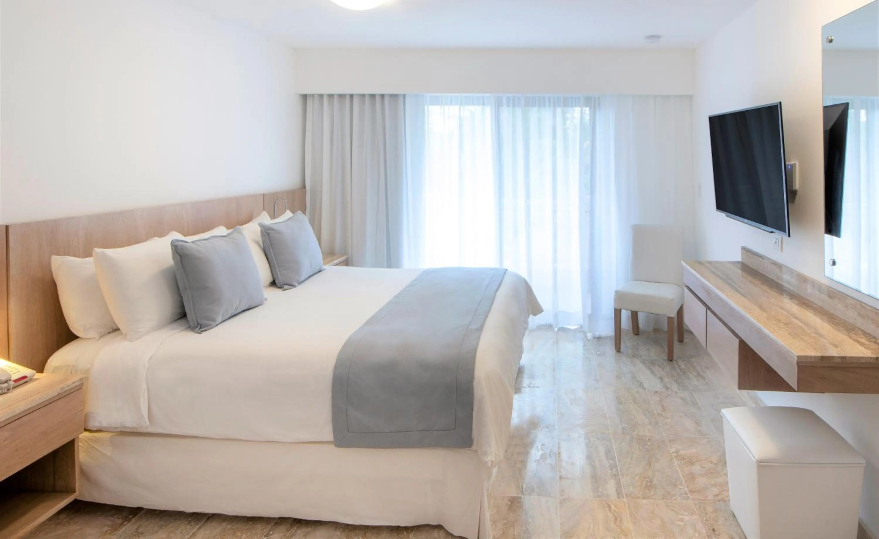 Bed in Viva Dominicus Palace by Wyndham, A Trademark All Inclusive