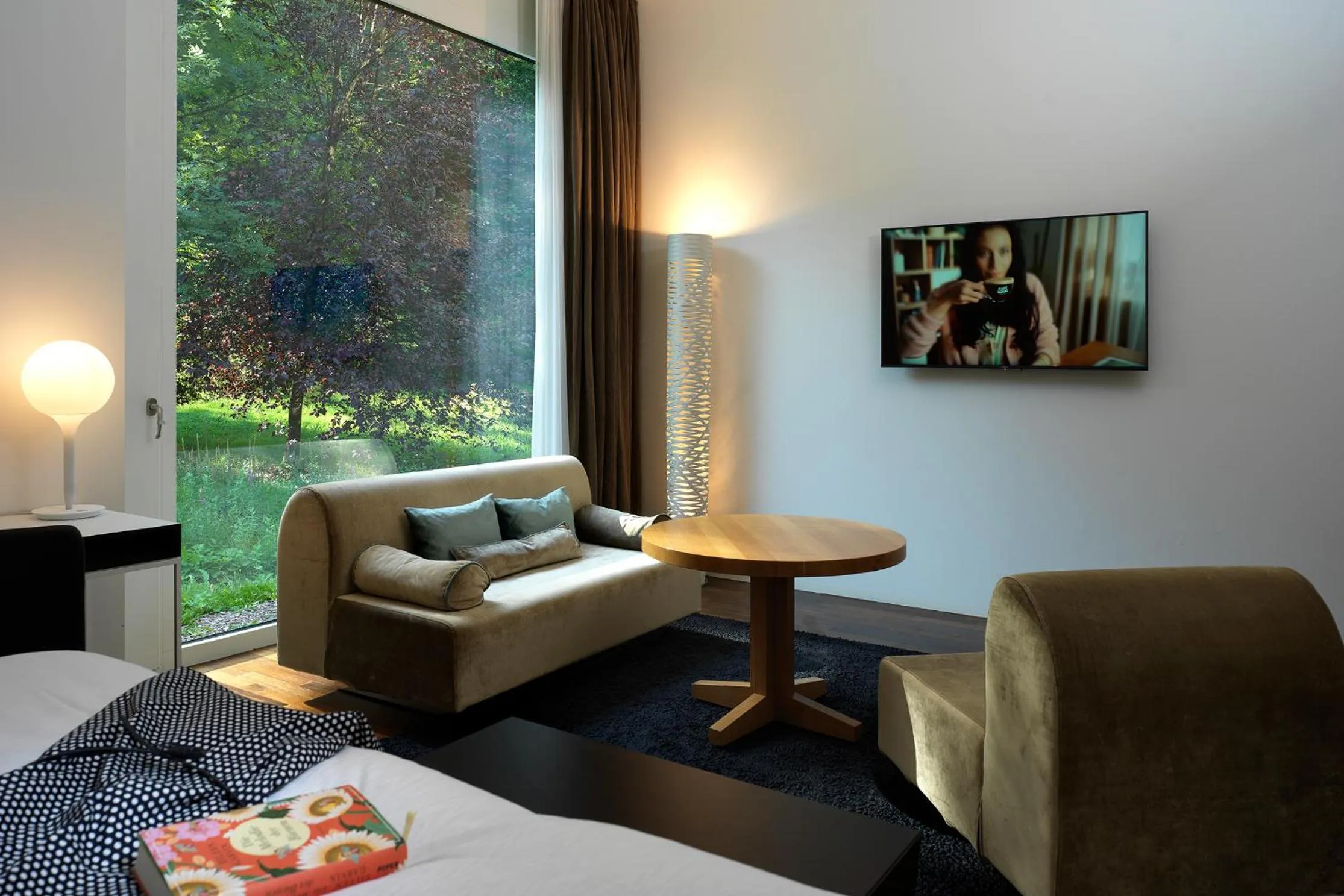 Seating area, Bed in City Garden Hotel