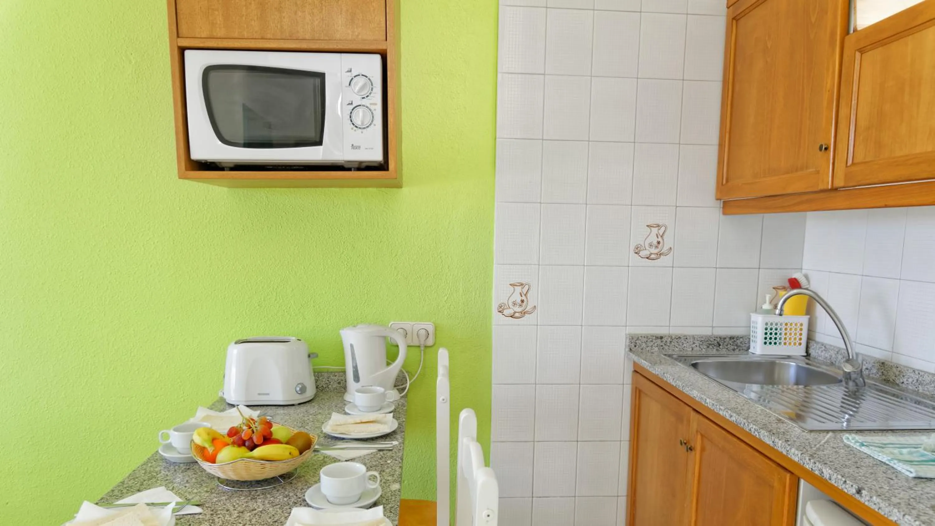 Kitchen or kitchenette in Apartamentos Monteparaiso
