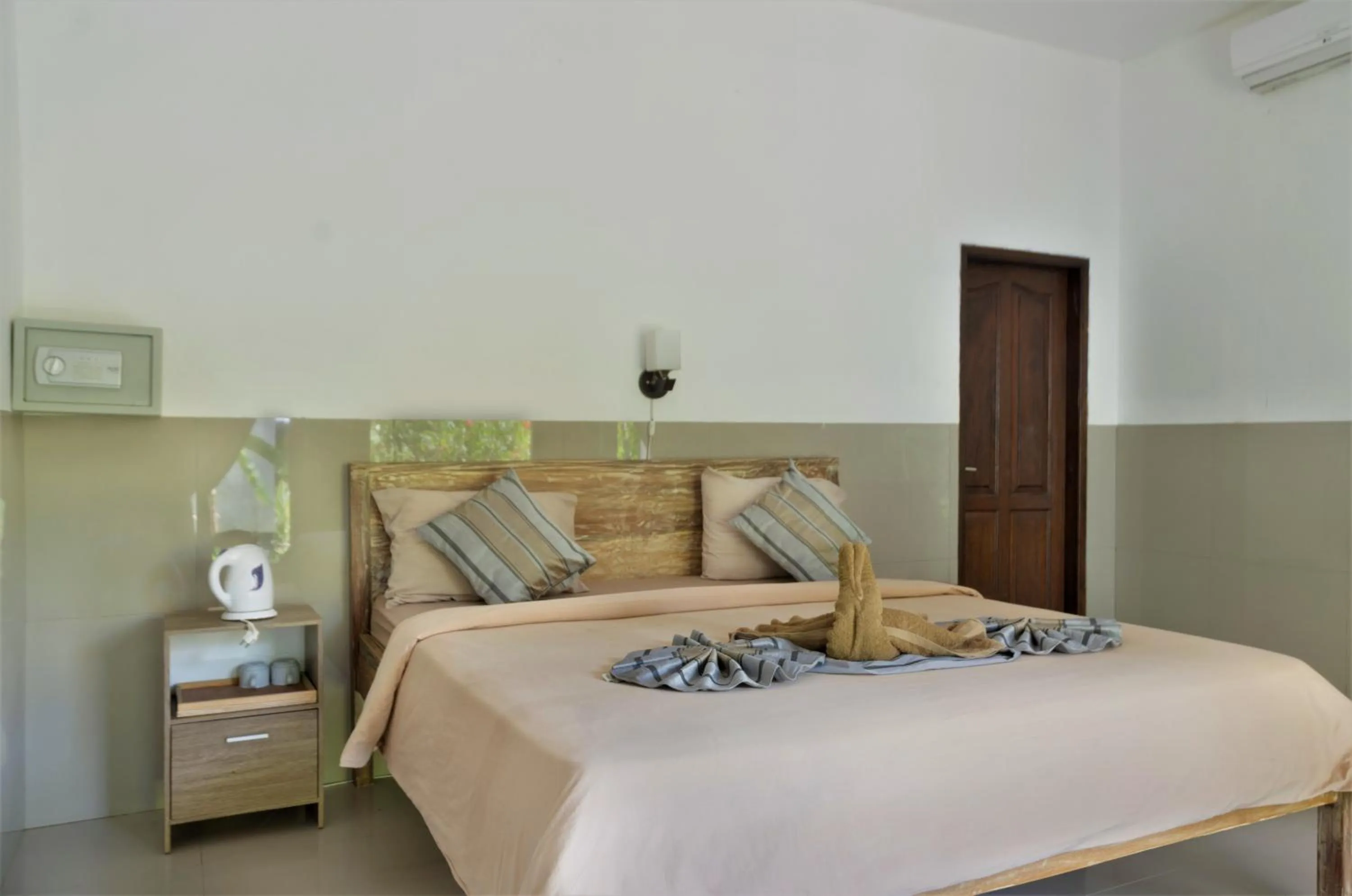 Bed in Warna Beach Hotel