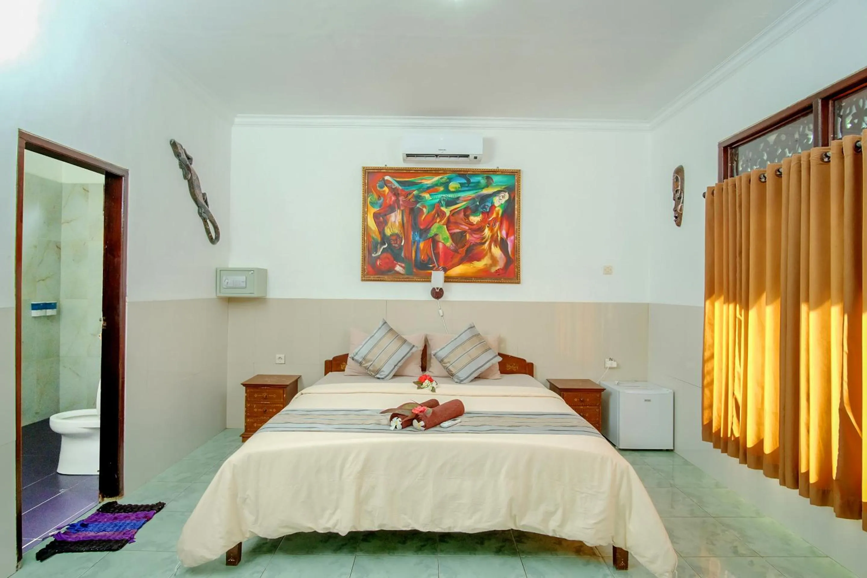 Bed in Warna Beach Hotel