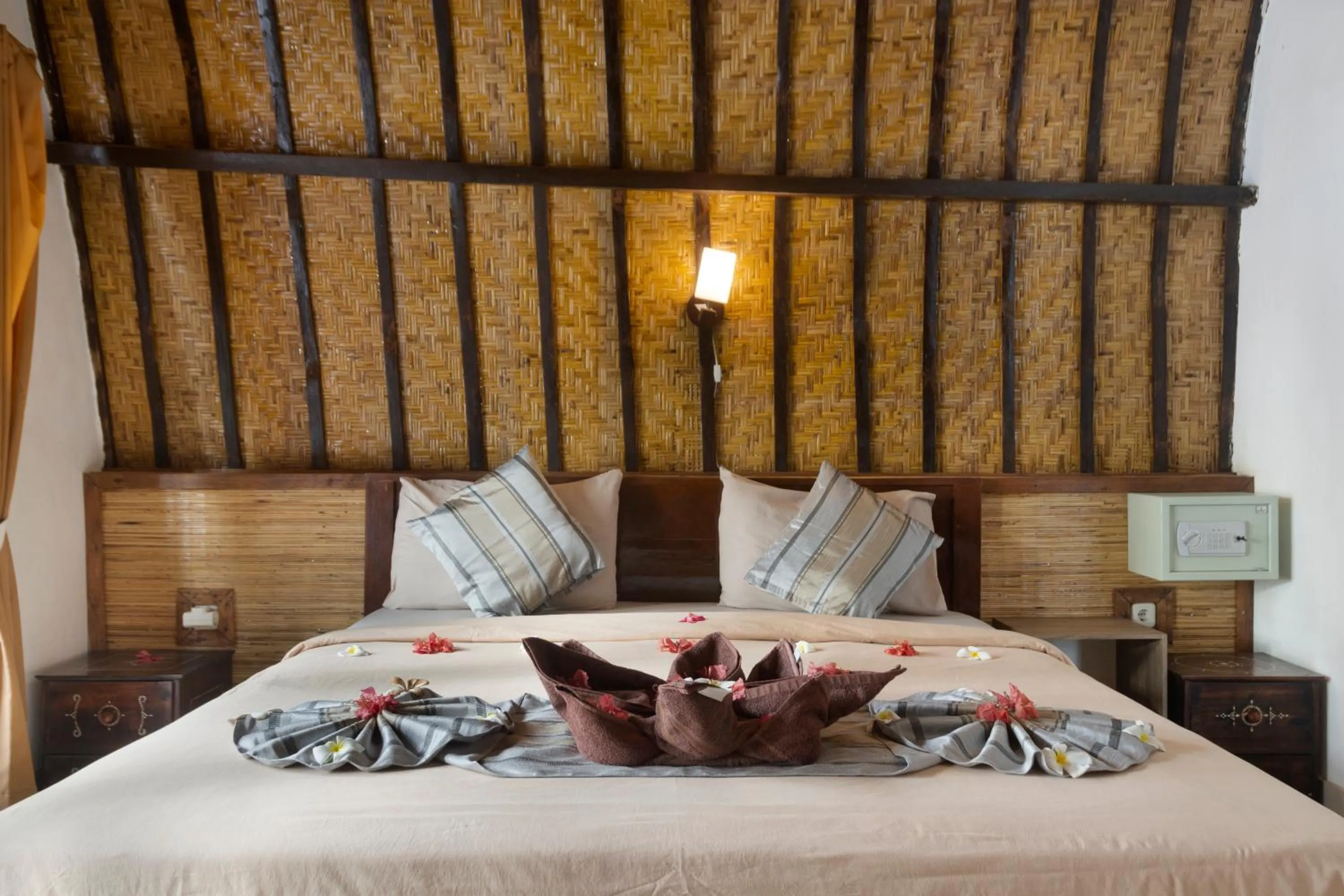 Bed in Warna Beach Hotel