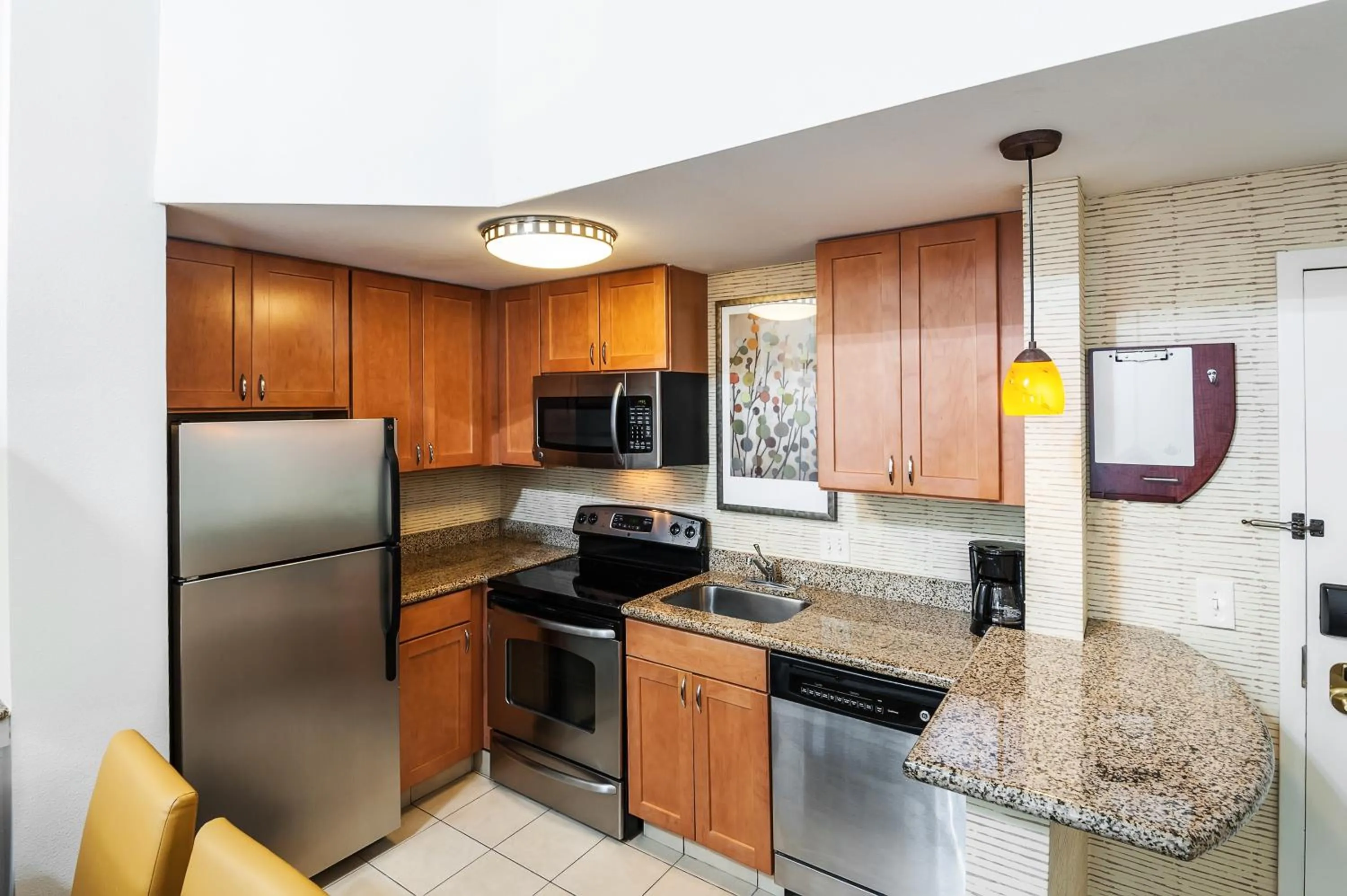kitchen in Residence Inn Orlando Airport